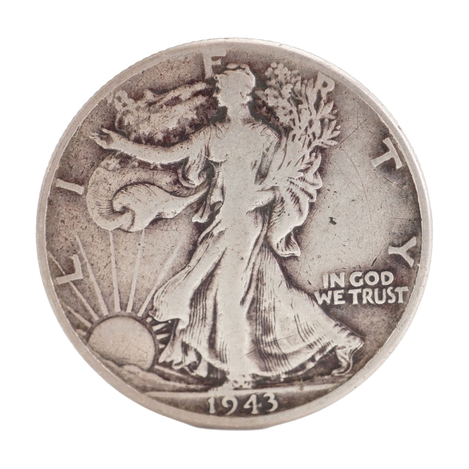 1943 U.S. Walking Liberty Half Dollar 90% Silver Coin, Circulated: Design includes obverse Liberty walking to the left with date below; Reverse has Eagle with wings spread and denomination below. Total weight 12g. Dimensions: 30.6mm Date or Era: 1943 Country of Origi