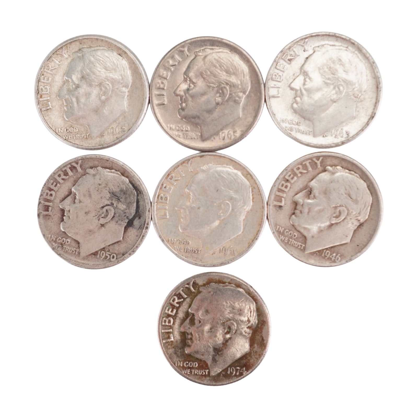 Lot of 7 U.S. Roosevelt Silver Dimes 90% Silver, Circulated: Roosevelt Dimes obverse depicts a left profile of Franklin D. Roosevelt, accompanied by the motto IN GOD WE TRUST with LIBERTY lettering. Reverse has an olive branch, a torch and an oak branch with E 