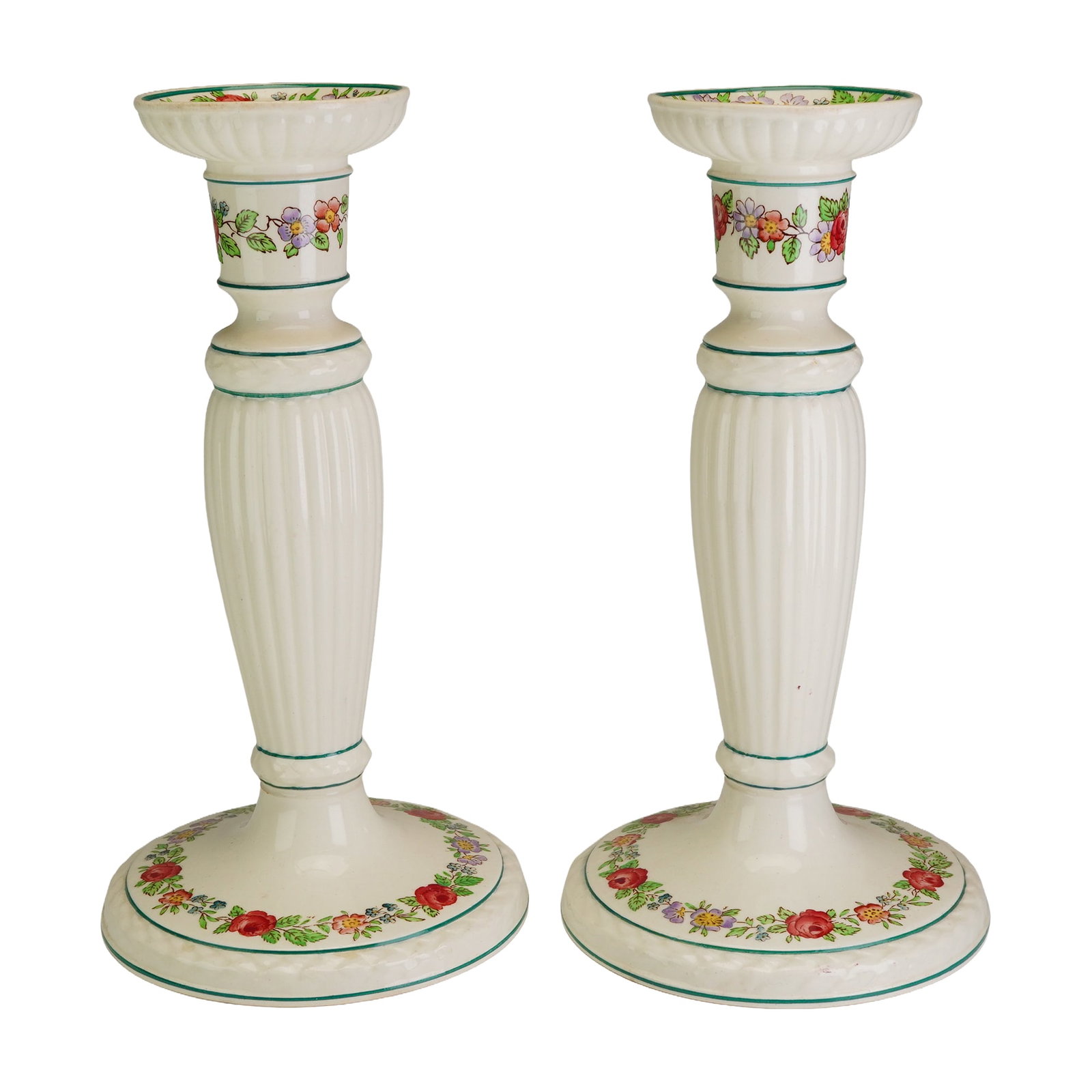 Pair of Wedgwood Etruria Belmar Pattern Ceramic Candlesticks: A pair of Wedgwood ceramic candlesticks in the Belmar pattern, featuring a molded neoclassical form with a cream-colored glaze. Each candlestick is designed with a fluted central column and a flared, 