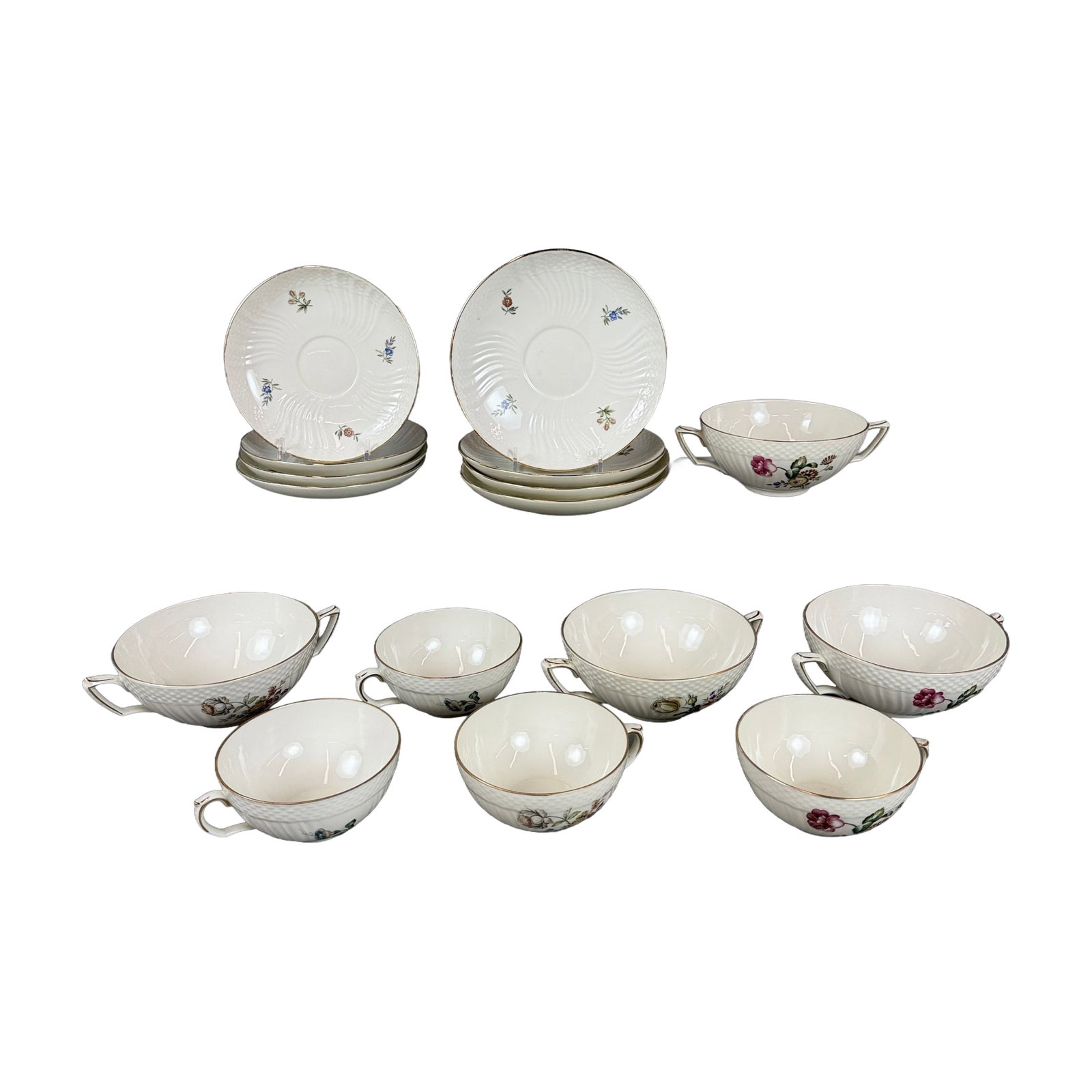 16pc Royal Copenhagen Porcelain Soup Bowls, Cups and Saucers with Frijsenborg Pattern: This 16pc Royal Copenhagen grouping is rendered in the Frijsenborg pattern, identified by pattern number 910. The set is constructed from fine porcelain featuring an ivory-white glaze and a distinctiv