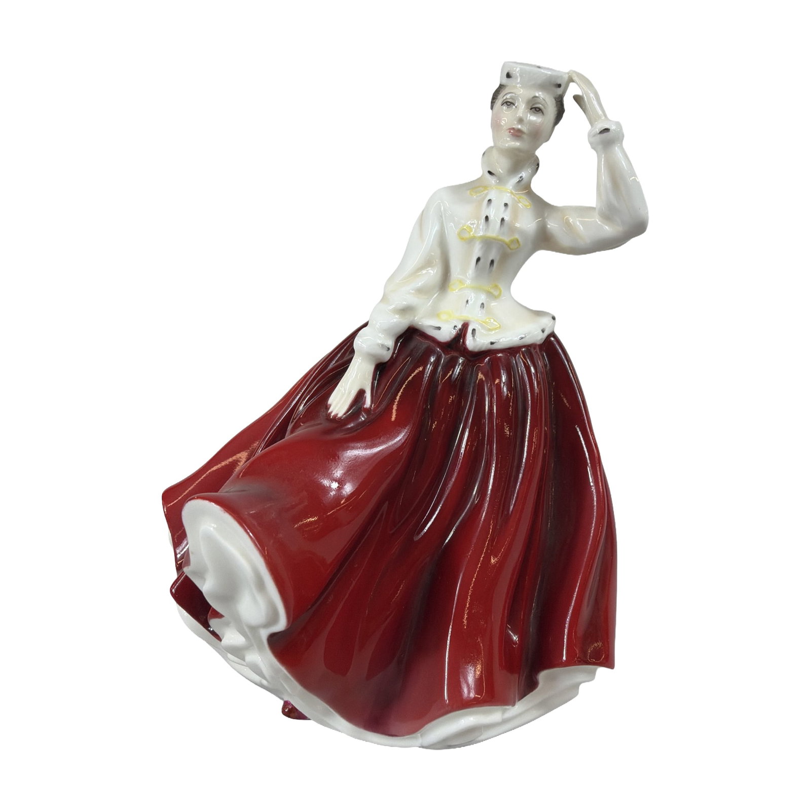 Royal Doulton Gail Bone China Figurine HN 2937: Royal Doulton bone china figurine titled Gail, HN 2937, hand-decorated in a red skirt and white bodice with gold trim, modeled by Peter A. Gee. Royal Doulton backstamp present on base. Weight: 1 lb 3.