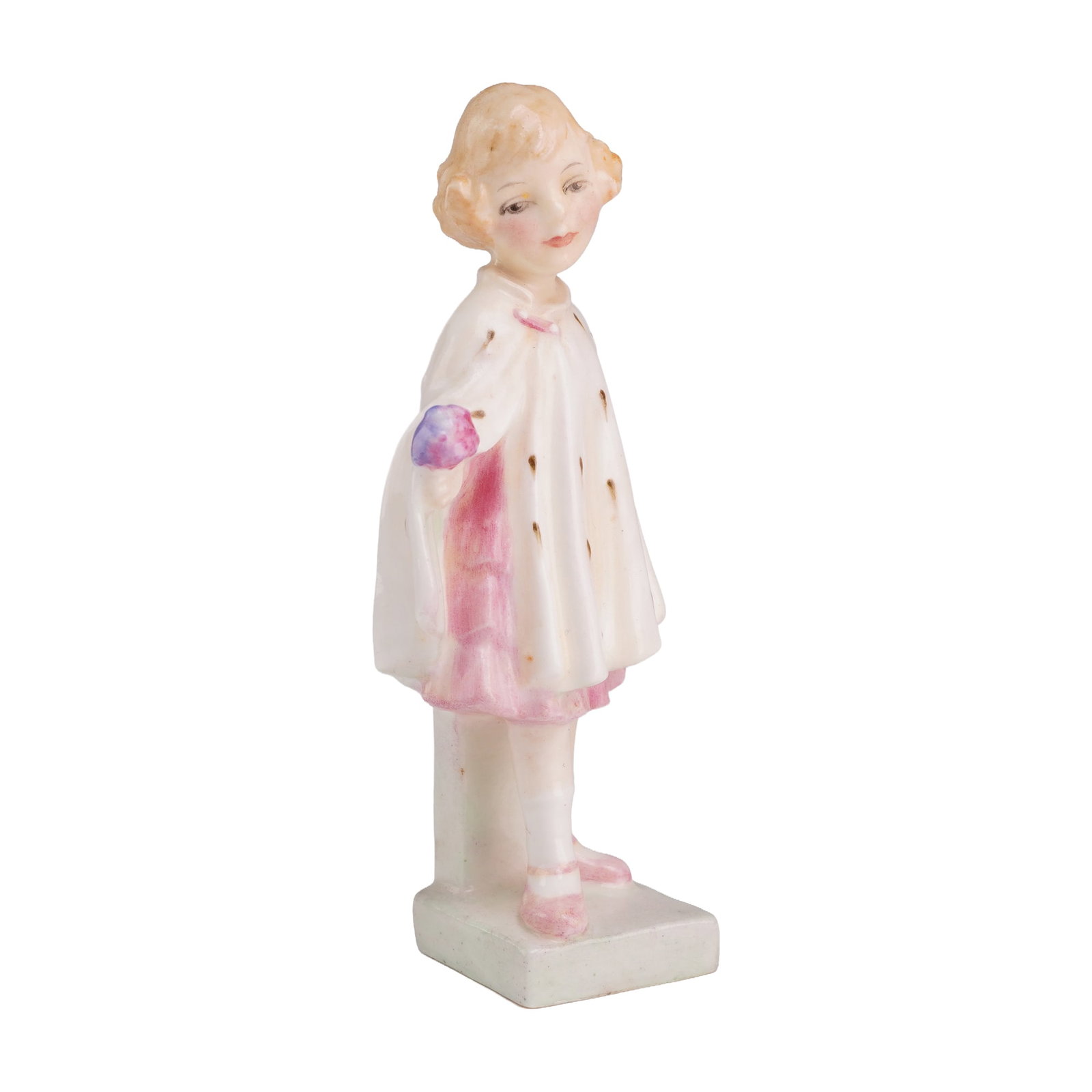 Royal Doulton Miniature Figurine Erminie M40: This Royal Doulton porcelain miniature figurine, depicts a young girl with short, wavy blonde hair. She is dressed in a white cloak featuring painted black ermine spots draped over a pink ruffled dres