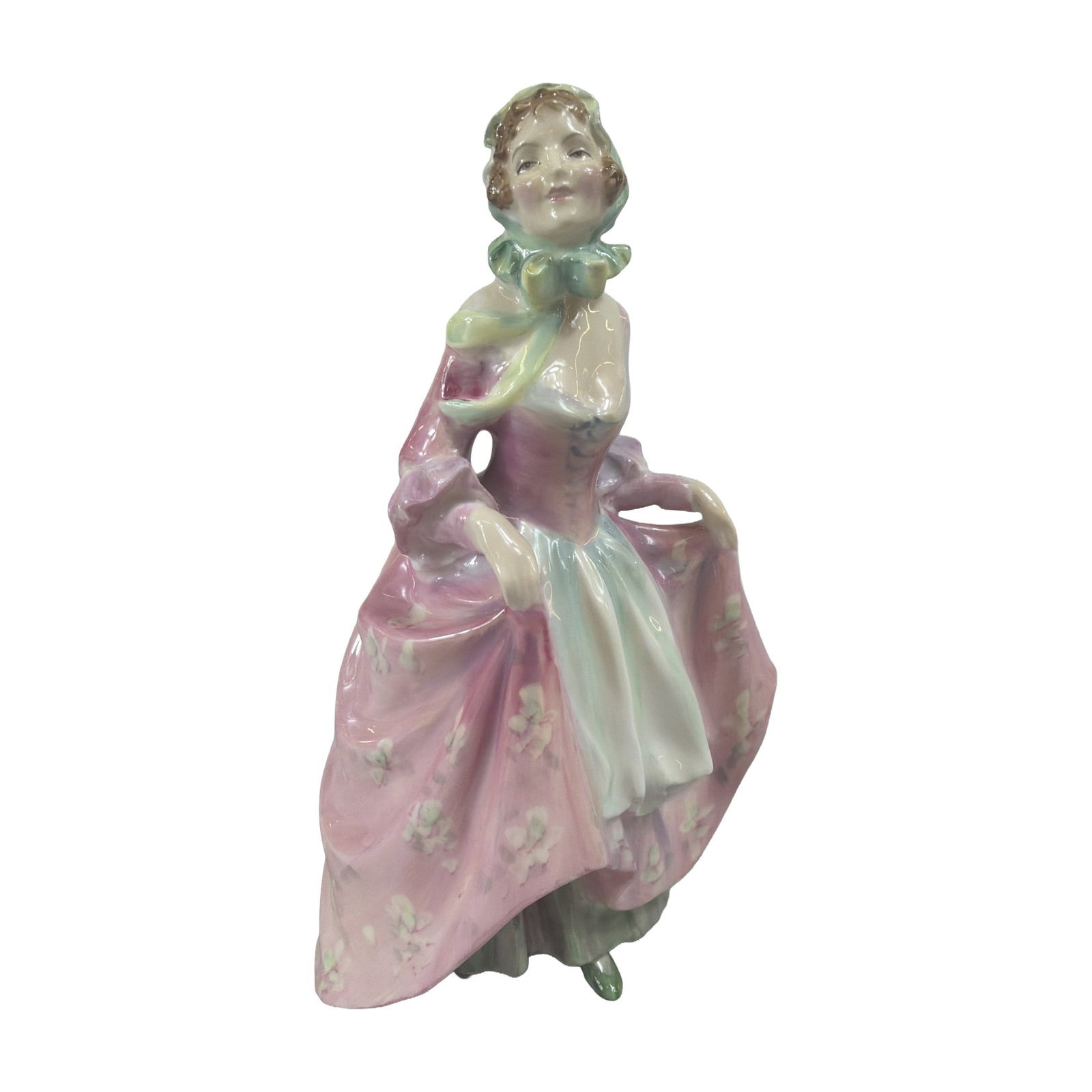 Royal Doulton Suzette Bone China Figurine HN2026: Royal Doulton glazed bone china figurine titled Suzette, model HN 2026, designed by Leslie Harradine. The figure depicts a young woman in a mid-19th century style dress featuring a voluminous pink flo