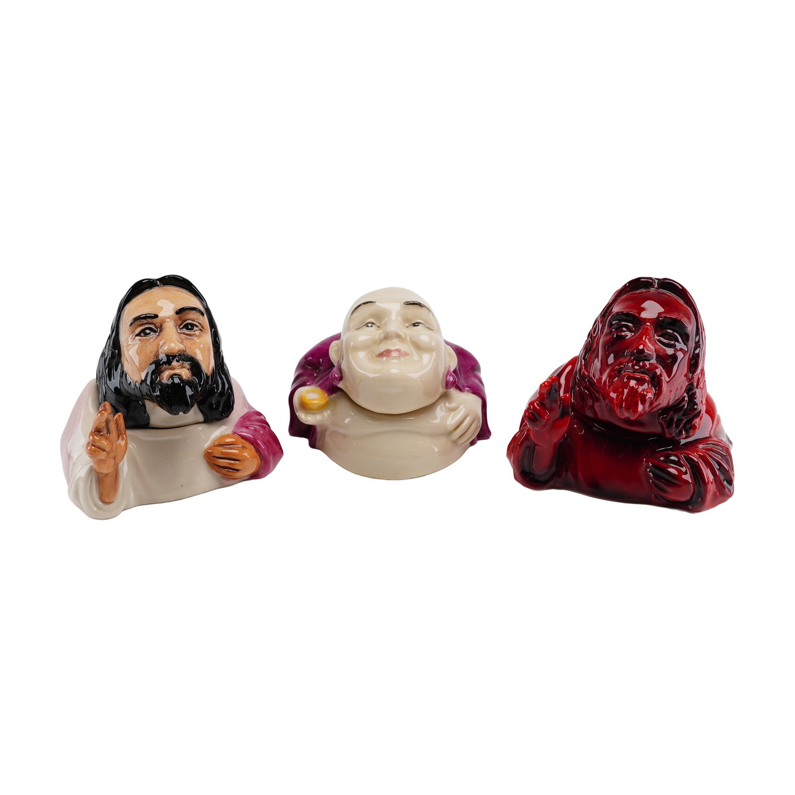 Lot of 3 Kevin Francis Ceramics Face Pots Including Jesus Flambe Prototype and Buddha: A lot of three miniature lidded glazed porcelain Face Pots produced by Kevin Francis Ceramics in England. The collection consists of two depictions of Jesus Christ and one depiction of Buddha. Each pi