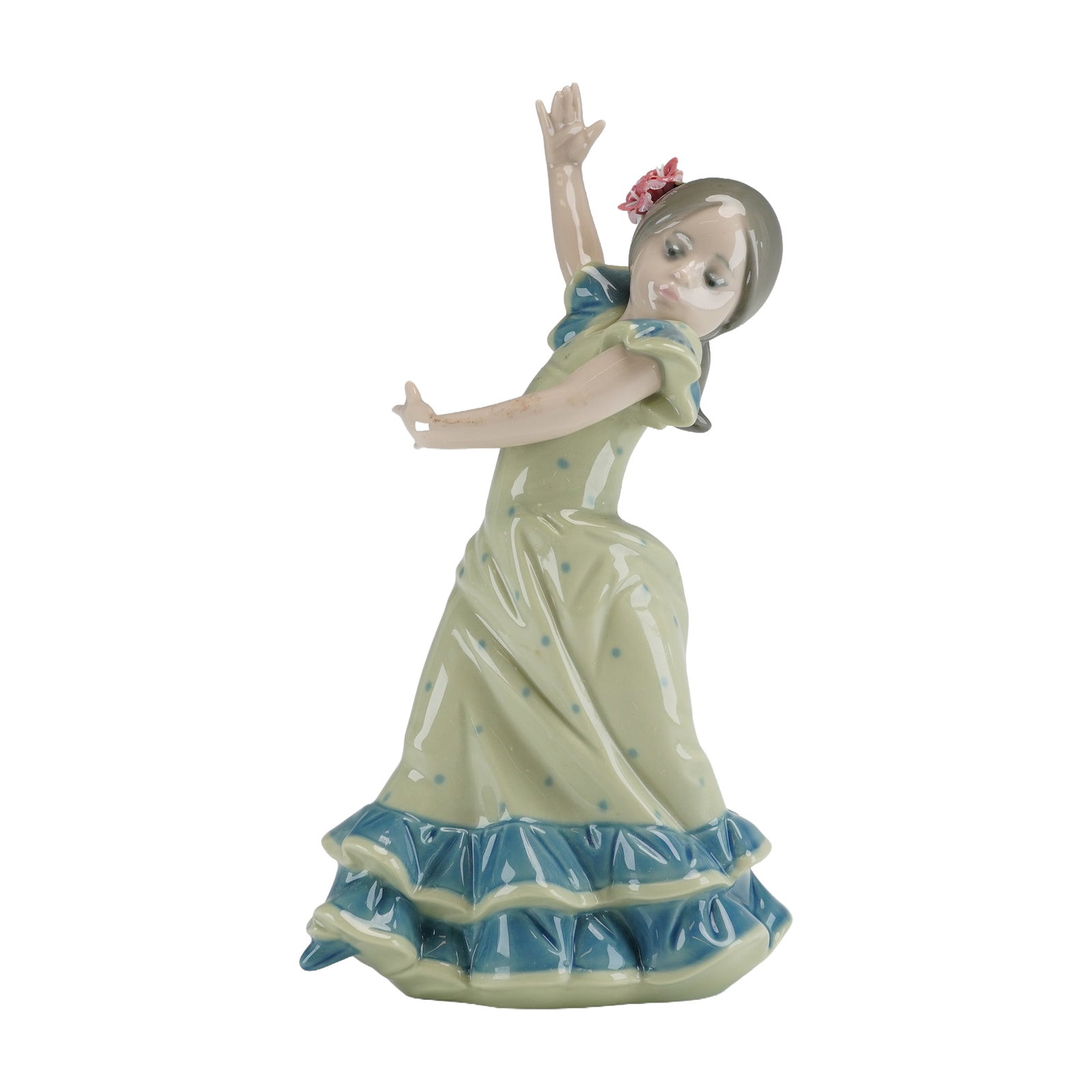 Lladro Lolita Flamenco Dancer Porcelain Figurine, Model 5308: A fine glazed porcelain figurine by Lladro titled Lolita, model number 5308, depicting a young girl in a traditional Spanish flamenco dance pose. The figure is dressed in a pale green traje de flamenc