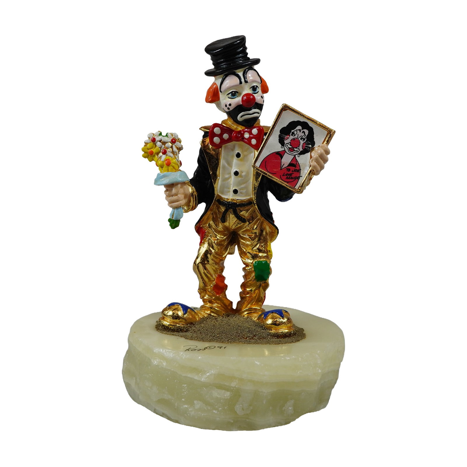 Ron Lee Signed 1991 Spring Onyx Clown Sculpture: Ron Lee (American, 1947-2017), "Spring," a hand-painted metal clown sculpture on an onyx base. The figurine depicts a hobo-style clown wearing a black tuxedo with gold accents, colorful patches, and a