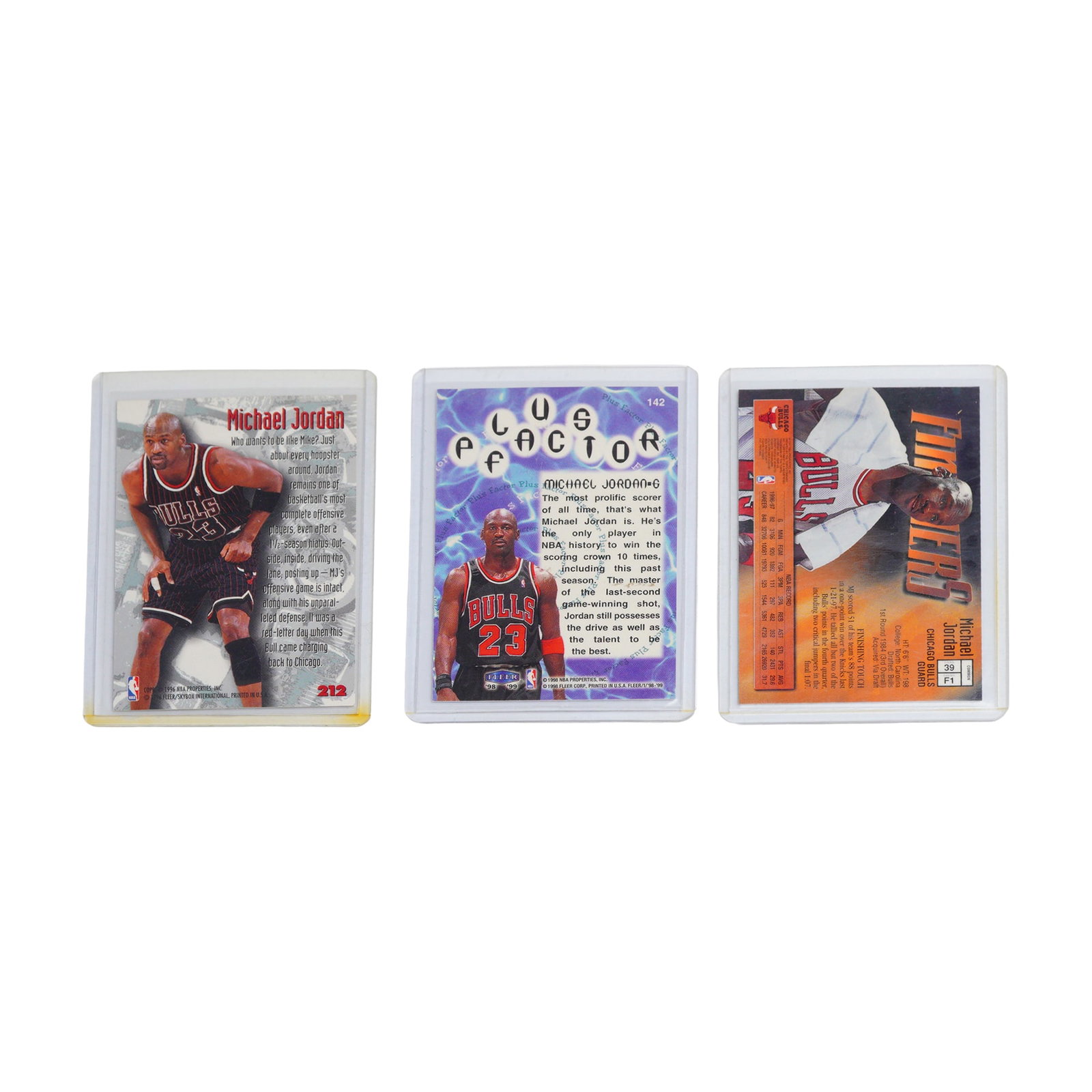 Trio of Michael Jordan Chicago Bulls Trading Cards 1998 99 Fleer, Non-refractor: A trio of Michael Jordan basketball trading cards from the late 1990s, featuring the athlete in his Chicago Bulls uniform. The group includes a 1996 Fleer Nuts & Bolts card, a 1998-99 Fleer Tradition 