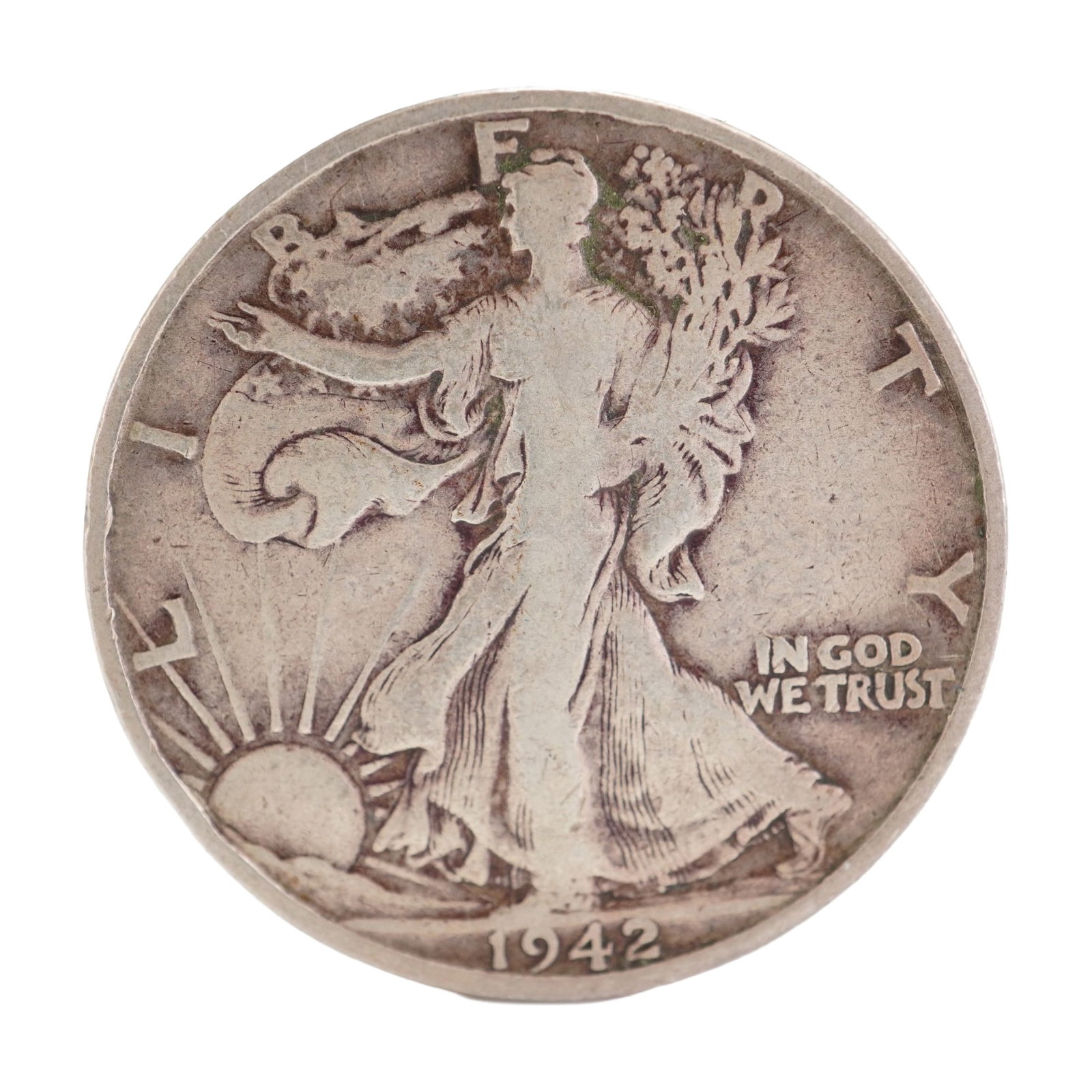 1942 U.S. Walking Liberty Half Dollar 90% Silver Coin, Circulated: Design includes obverse Liberty walking to the left with date below; Reverse has Eagle with wings spread and denomination below. Total weight 12g. Dimensions: 30.6mm Date or Era: 1942 Country of Origi