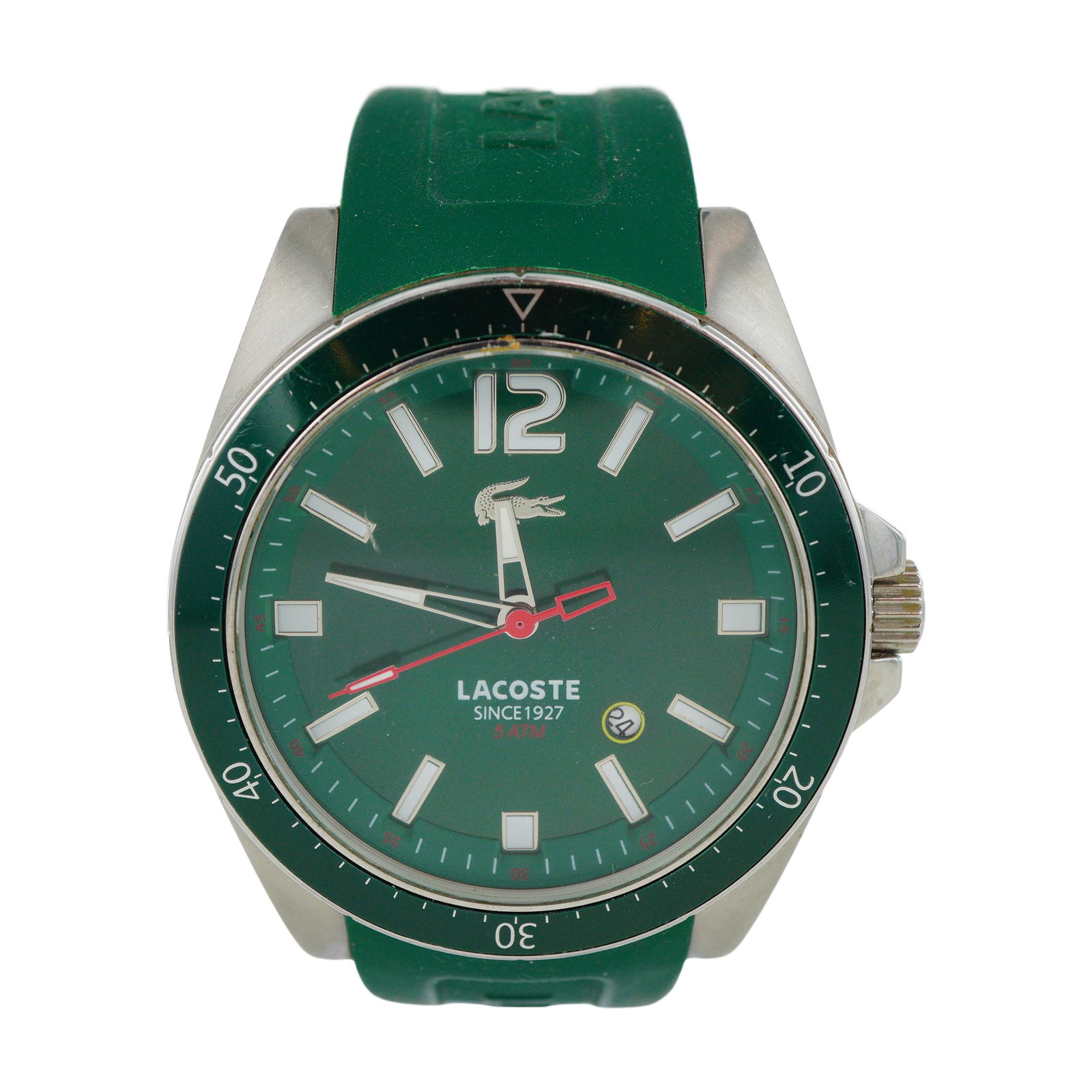 Lacoste Seattle Stainless Steel Quartz Wristwatch: This Lacoste Seattle wristwatch features a quartz movement housed within a stainless steel case. The design includes a green unidirectional rotating bezel with a 60-minute scale and a matching green d