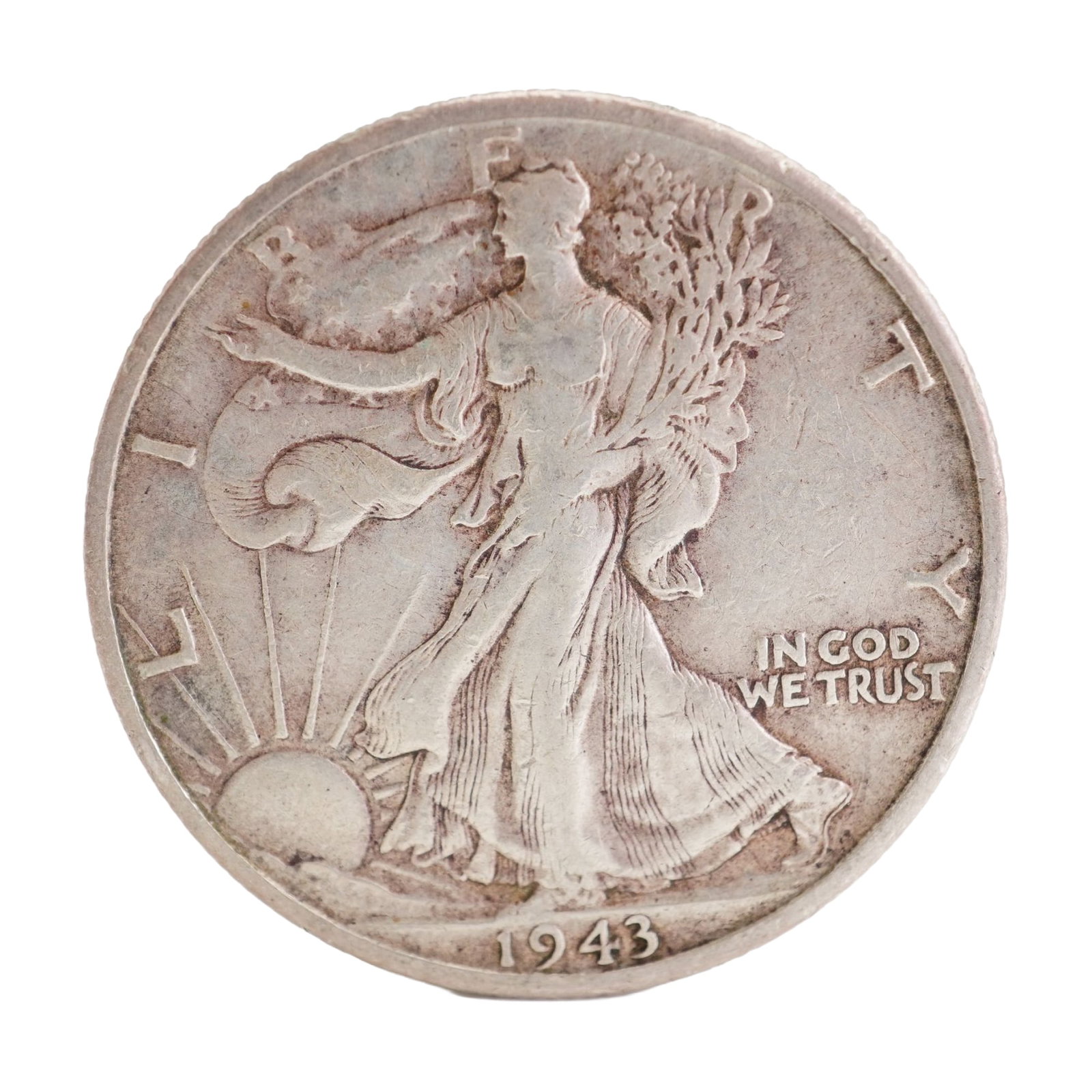 1943 U.S. Walking Liberty Half Dollar 90% Silver Coin, Circulated: Design includes obverse Liberty walking to the left with date below; Reverse has Eagle with wings spread and denomination below. Total weight 12g. Dimensions: 30.6mm Date or Era: 1943 Country of Origi