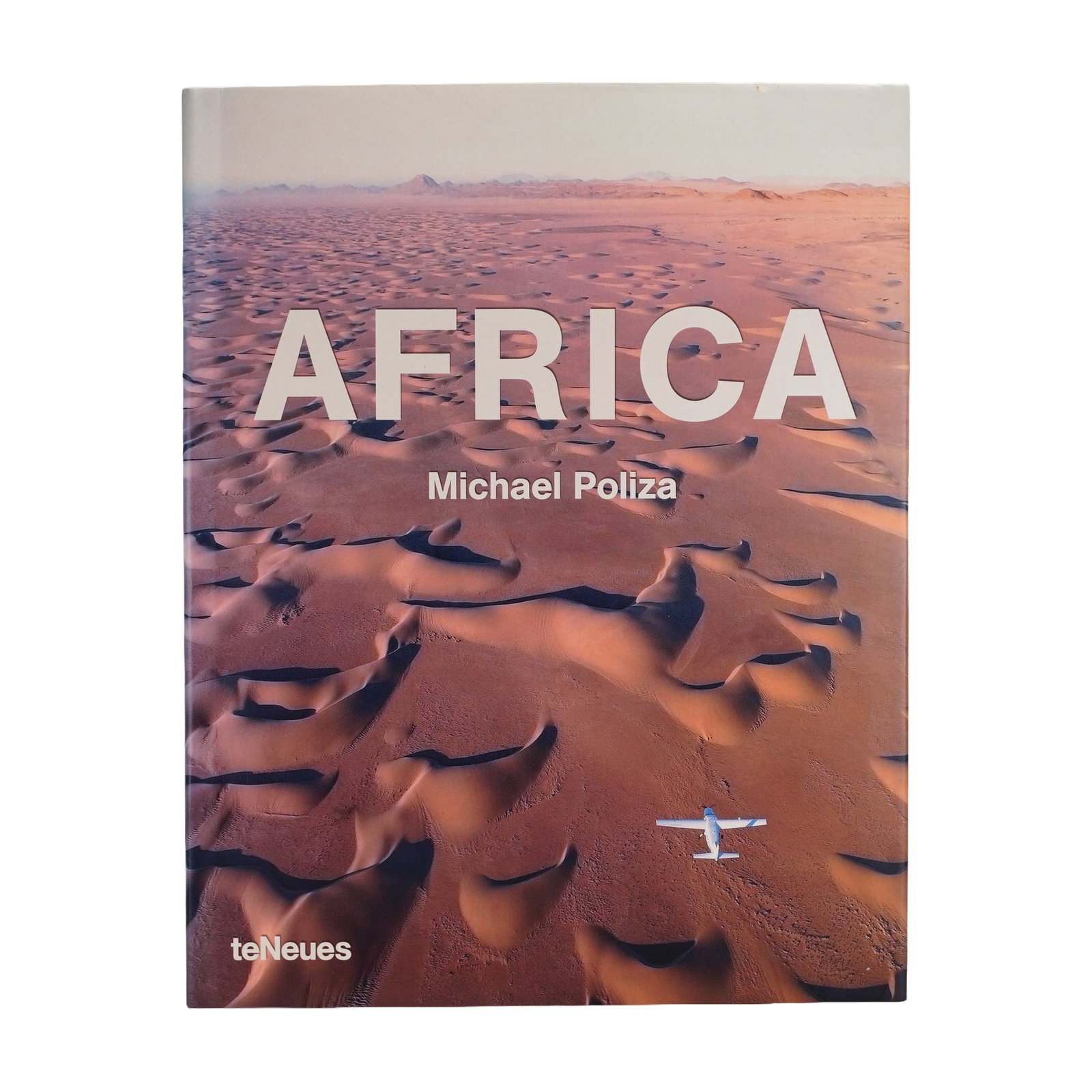 Poliza, Michael. Africa. teNeues, 2006. First Edition (DJ): Author: Michael Poliza. Full title: Africa. Kempen: teNeues, 2006. First edition. Binding: Publisher's oversize hardcover with pictorial boards and a matching pictorial dust jacket. Folio size. Number