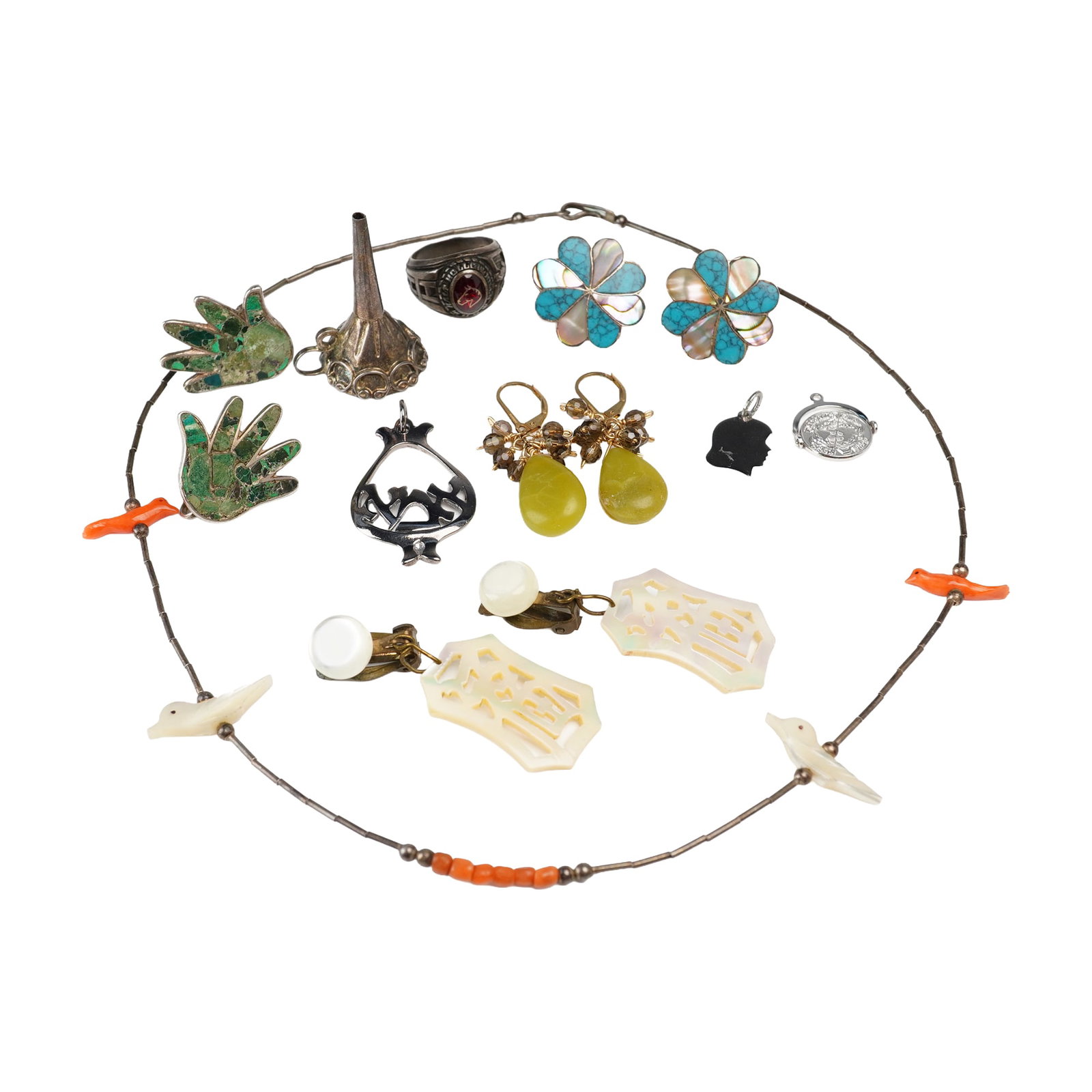 14pc Silver Toned Jewelry Including 4 Pairs of Earrings, 4 Pendants, 1 Ring and 1 Necklace: This collection of 14 pieces of silver toned jewelry includes a variety of vintage and cultural styles. The lot features four pairs of earrings: a pair of Mexican silver screw-back earrings with a flo
