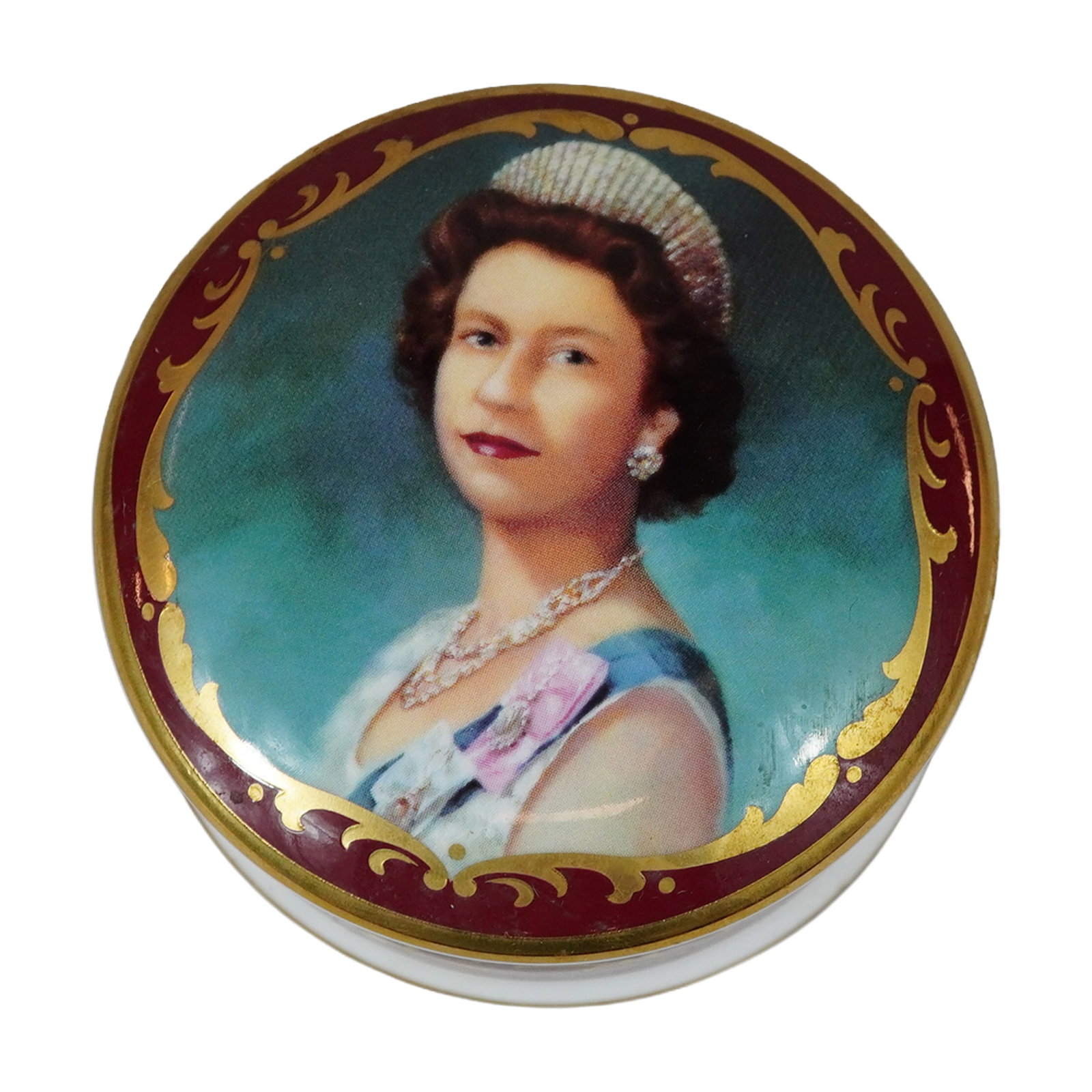 Coalport Bone China Queen Elizabeth II Golden Jubilee Limited Edition Commemorative Trinket Box: A circular lidded trinket box manufactured in fine bone china by Coalport to commemorate the Golden Jubilee of Queen Elizabeth II. The lid features a transfer-printed portrait of the Queen in formal r