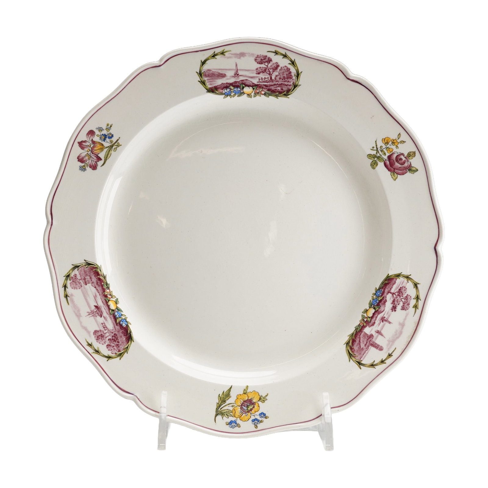 Wedgwood Etruria Creamware Plate, Clericy: The plate features a scalloped rim and a wide cavetto. The surface is decorated with transfer-printed reddish-purple designs showing alternating scenic cartouches of ships on calm waters, separated by