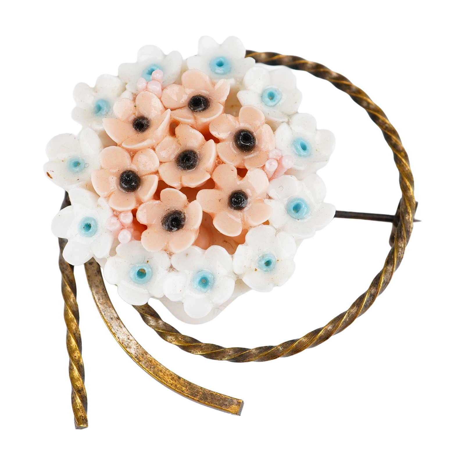 Wedgwood Hand Modeled Bone China Floral Brooch: A vintage hand modeled bone china floral brooch by Wedgwood. The design features a central bouquet of miniature porcelain flowers, including pink blossoms with black centers and white blossoms with bl