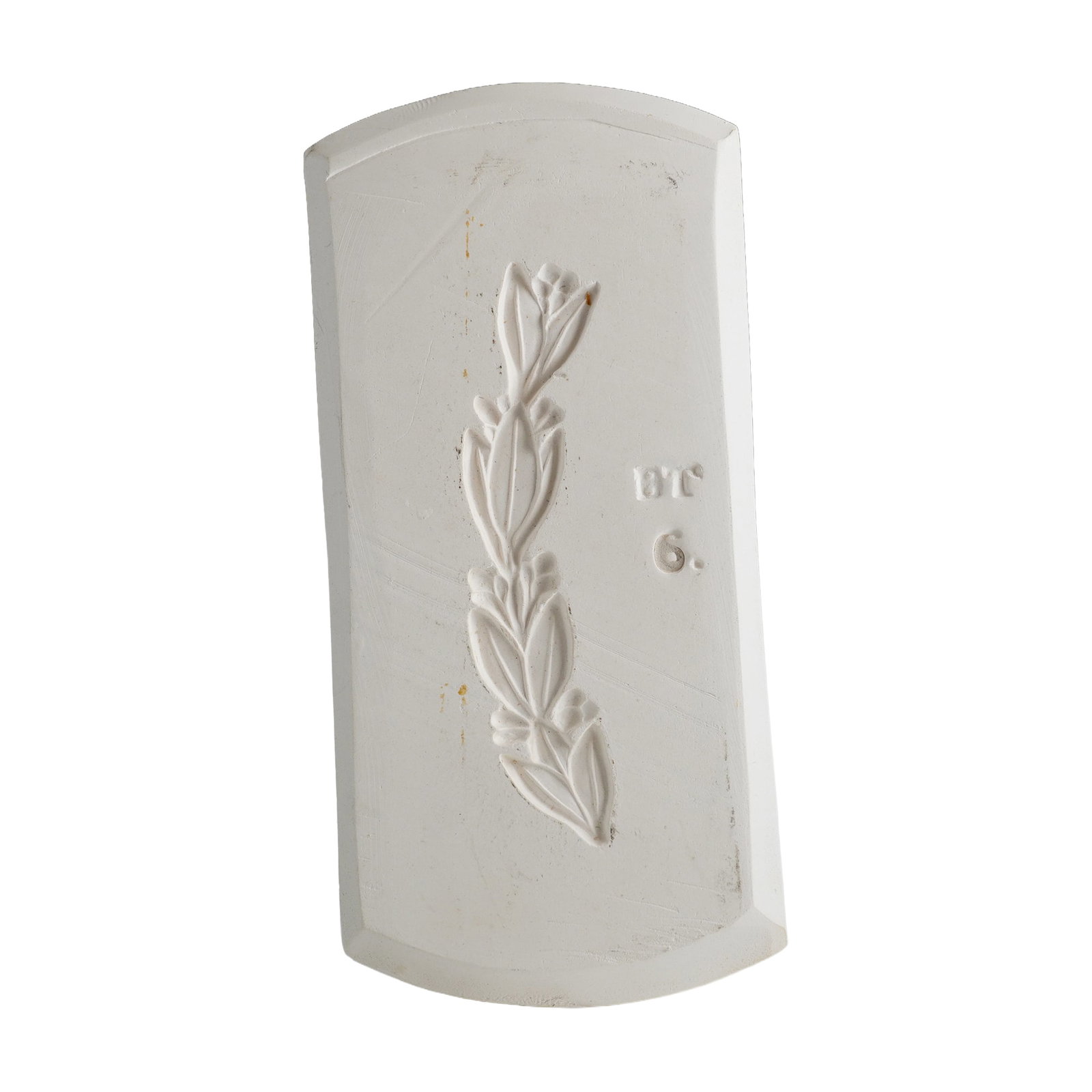 Wedgwood Leaf Garland Industrial Mold: An industrial master mold manufactured by Wedgwood. The elongated rectangular off-white plaster or bisque ceramic block features a high-relief scene depicting a stylized vertical leaf or husk garland 
