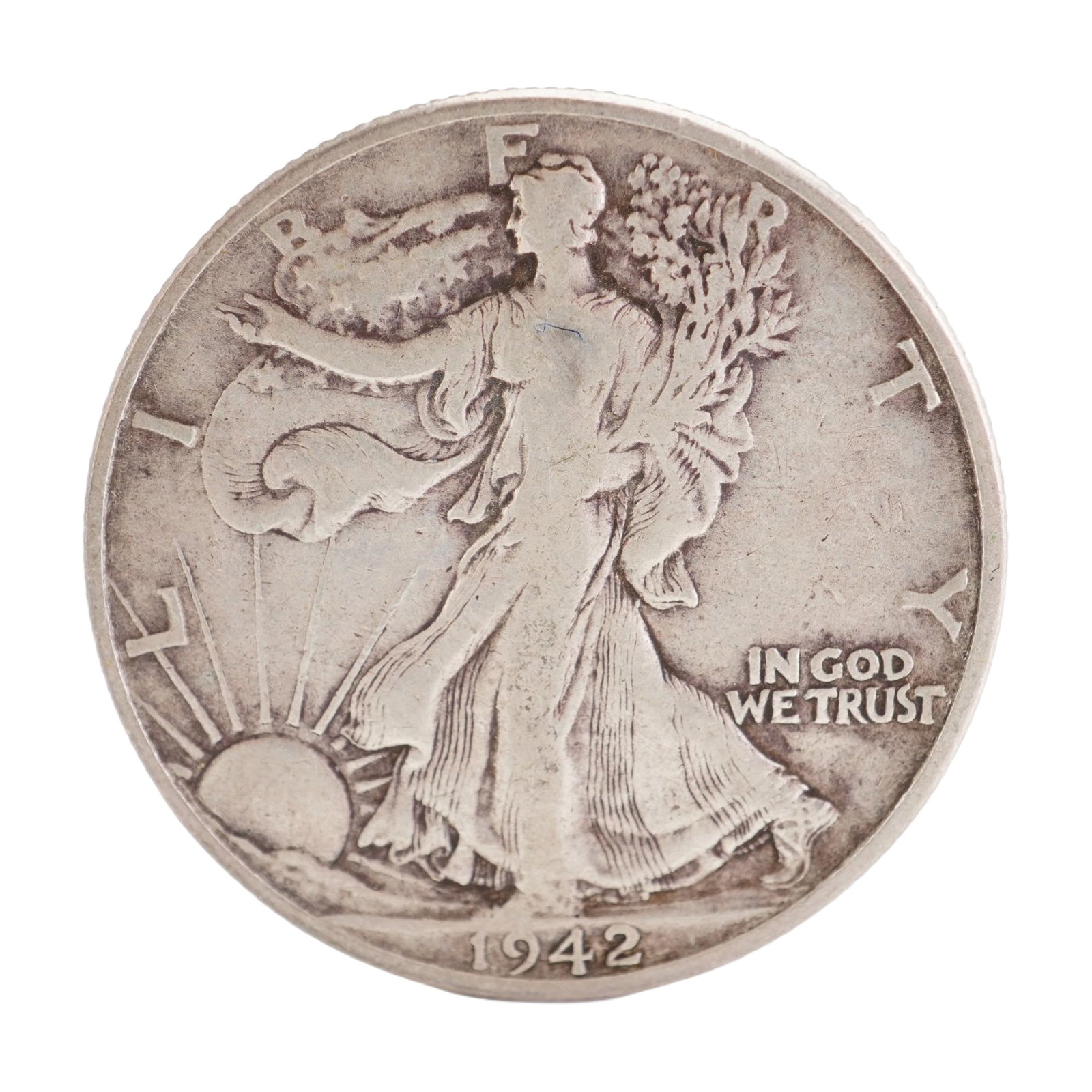 1942 U.S. Walking Liberty Half Dollar 90% Silver Coin, Circulated: Design includes obverse Liberty walking to the left with date below; Reverse has Eagle with wings spread and denomination below. Total weight 12g Dimensions: 30.6mm Date or Era: 1942 Country of Origin