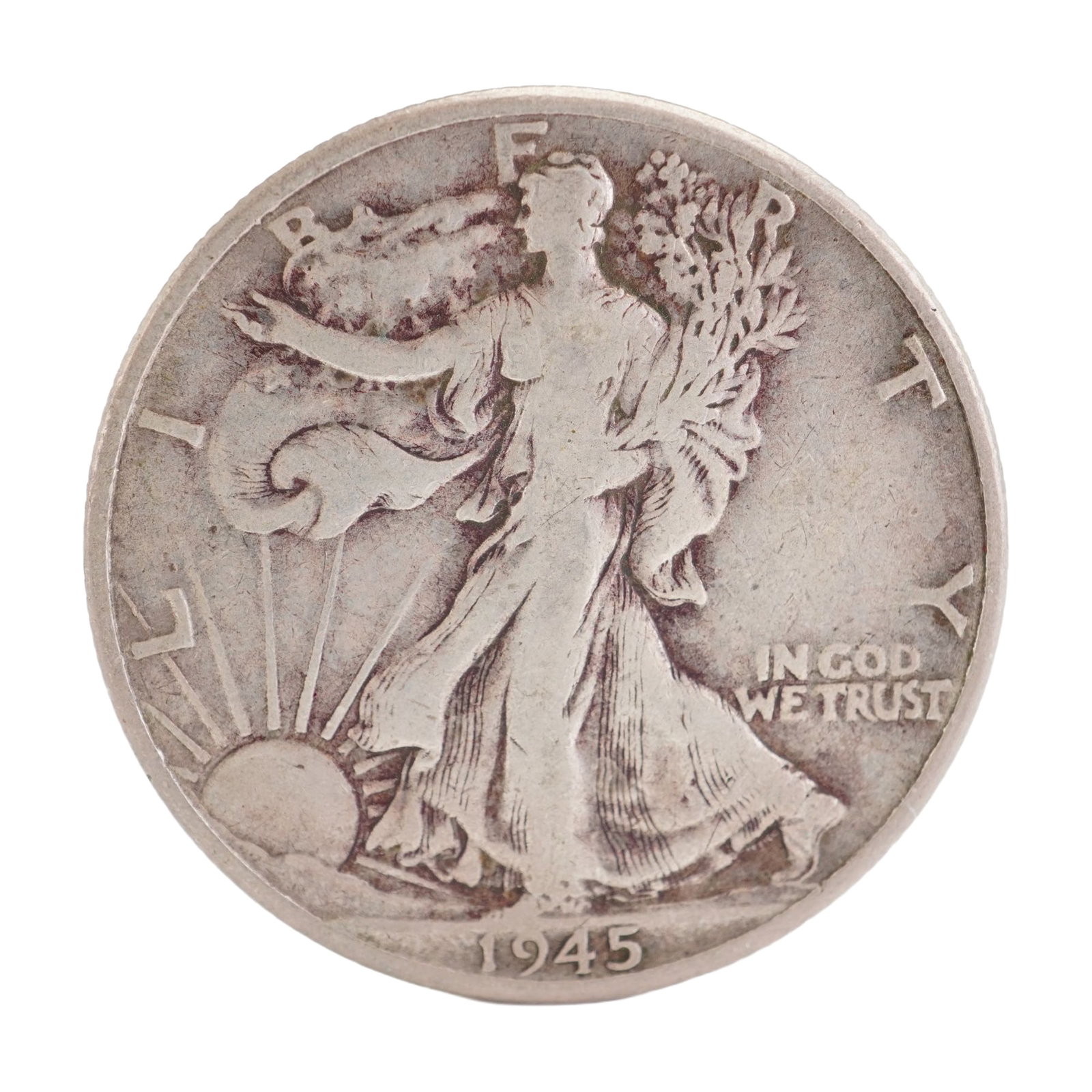 1945 U.S. Walking Liberty Half Dollar 90% Silver Coin, Circulated: Design includes obverse Liberty walking to the left with date below; Reverse has Eagle with wings spread and denomination below. Total weight 14g. Dimensions: 30.6mm Date or Era: 1945 Country of Origi