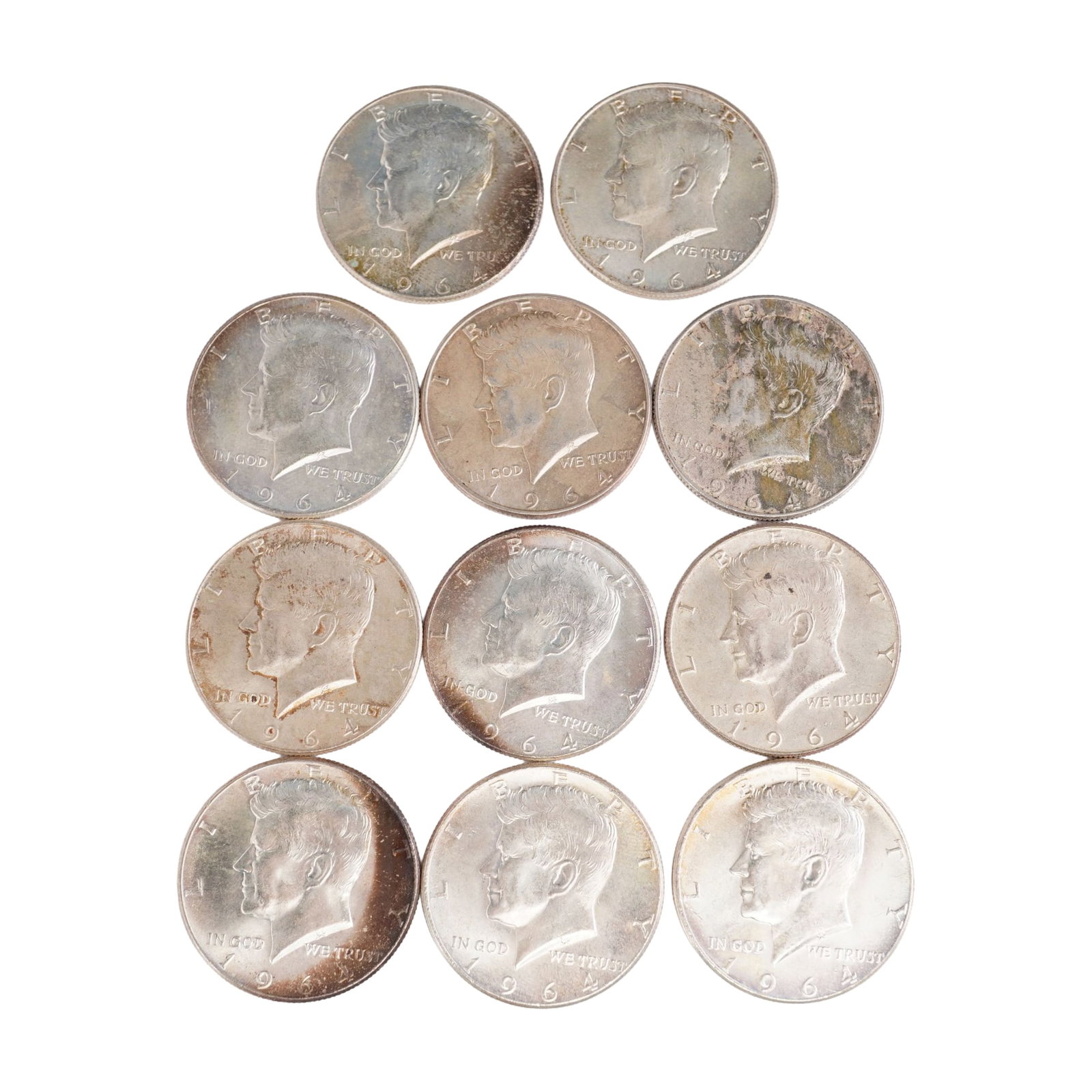 Lot of 11 1964 Kennedy Half Dollar 90% Silver Coin, Circulated: Obverse design is portrait of John F. Kennedy to the left with date below. Reverse is modified presidential seal of the United States of America with eagle holding olive bran and bundle of 13 arrows. 