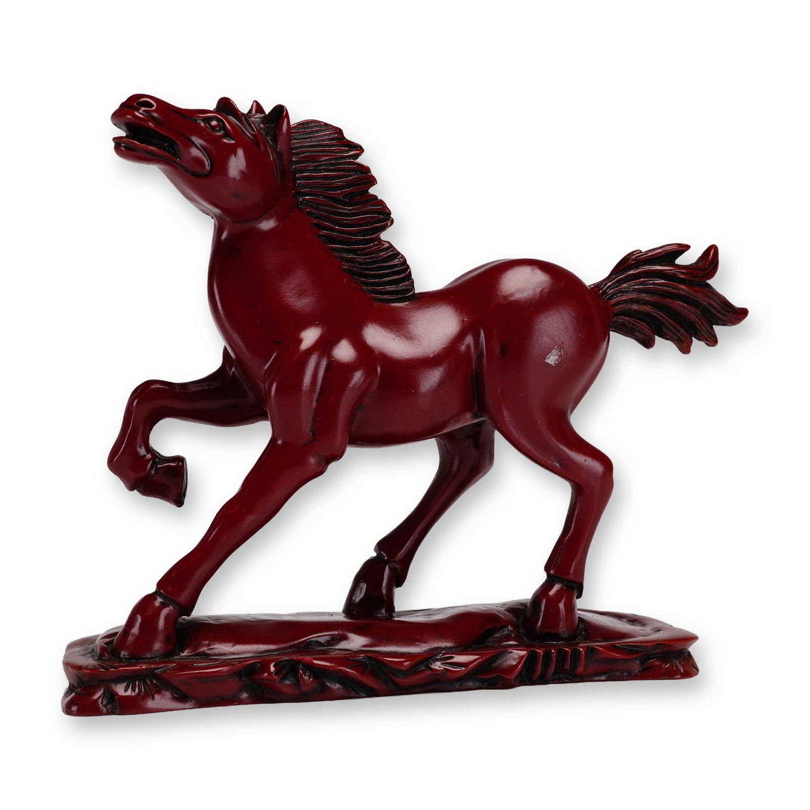 Chinese Dark Red Resin Figurine, Galloping Horse: Cinnabar-style casting of a galloping horse rendered in a dynamic pose with its head held high and one foreleg raised, set upon an integral rocky base. The piece is finished in a deep oxblood red colo