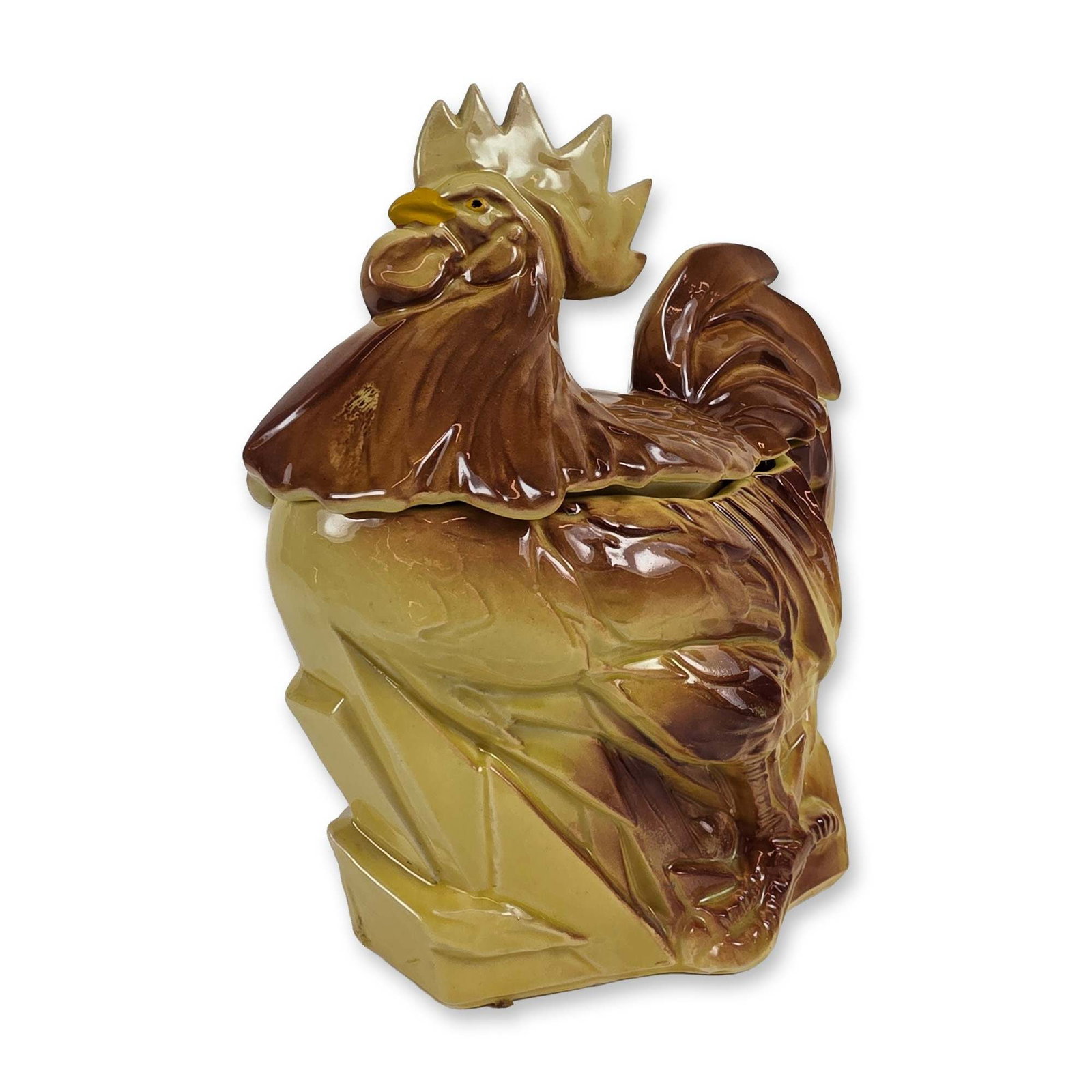McCoy Ceramic Rooster Cookie Jar: A stylized ceramic rooster cookie jar in glazed earthenware, featuring an angular, modernistic form. The two-piece lidded canister is finished in a high-gloss blended drip glaze with dark brown accent