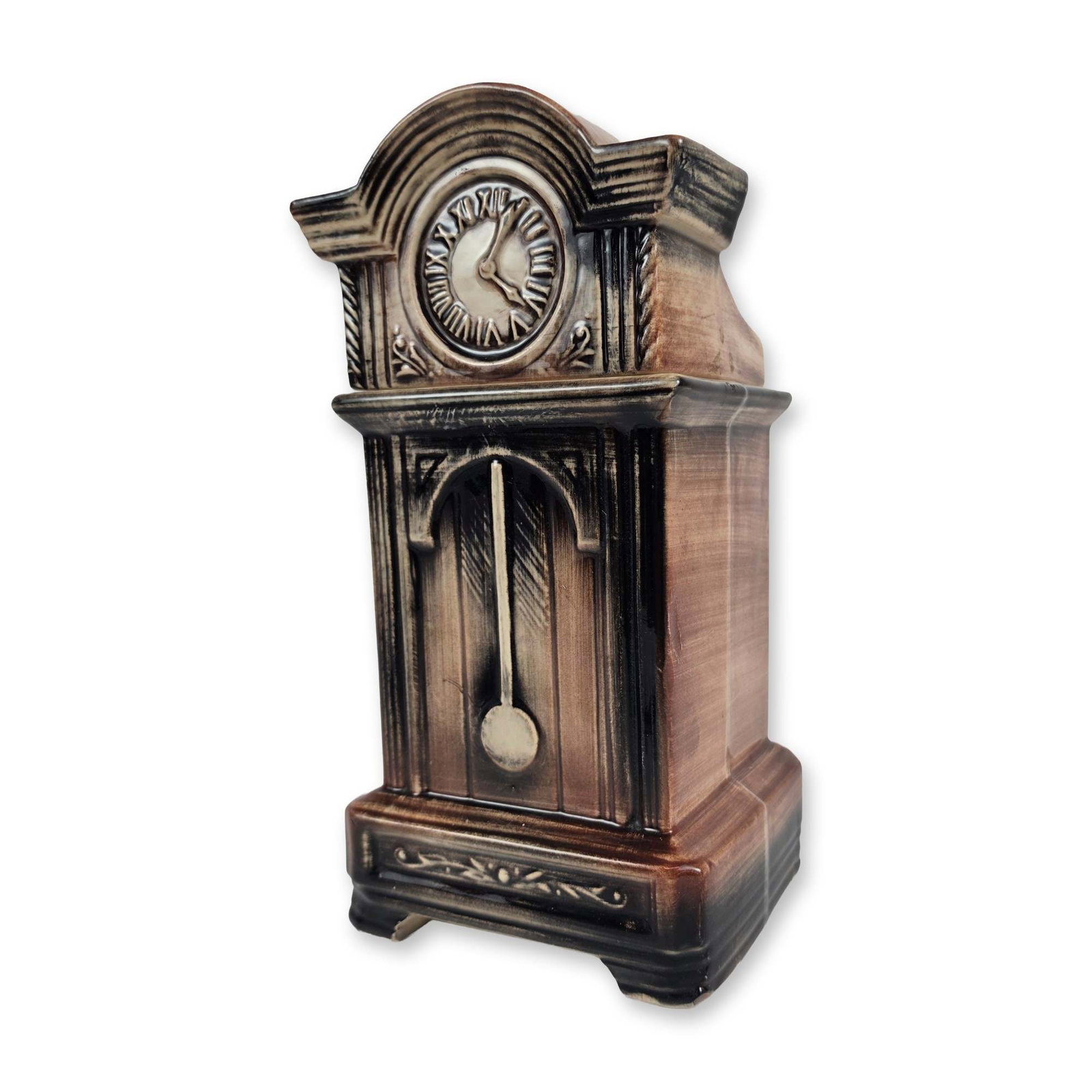 McCoy Ceramic Grandfather Clock Cookie Jar: Mid-century American ceramic cookie jar or canister designed in the form of a grandfather clock. The vessel is finished in a multi-toned brown glaze with textured woodgrain effects. Two-piece construc