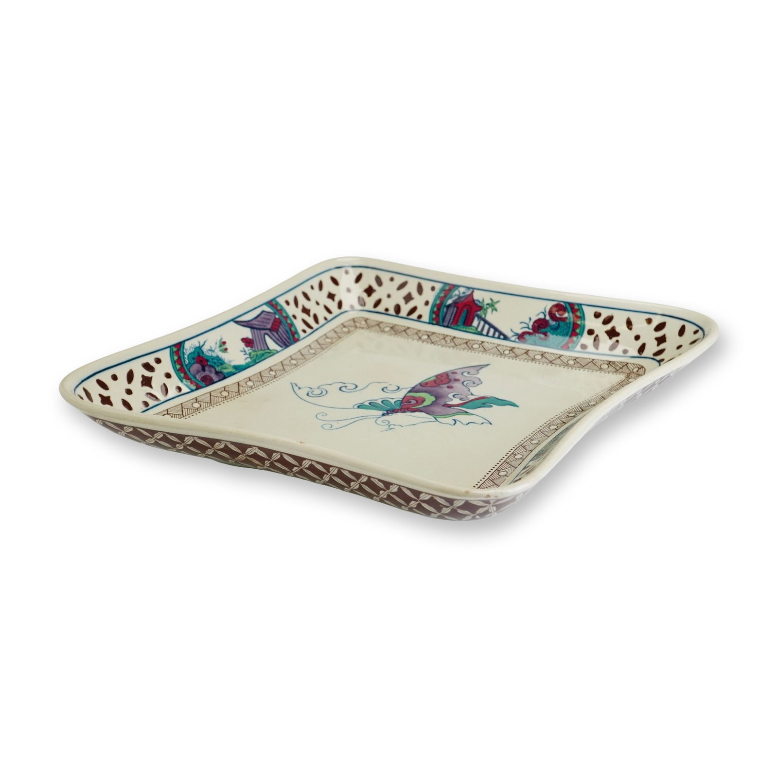 Wedgwood Nankin Square Creamware Serving Dish: This Wedgwood creamware square serving dish is decorated in the Nankin pattern with Chinoiserie motifs. The vessel features a square form with shaped, concave sides and rounded corners. The center is 