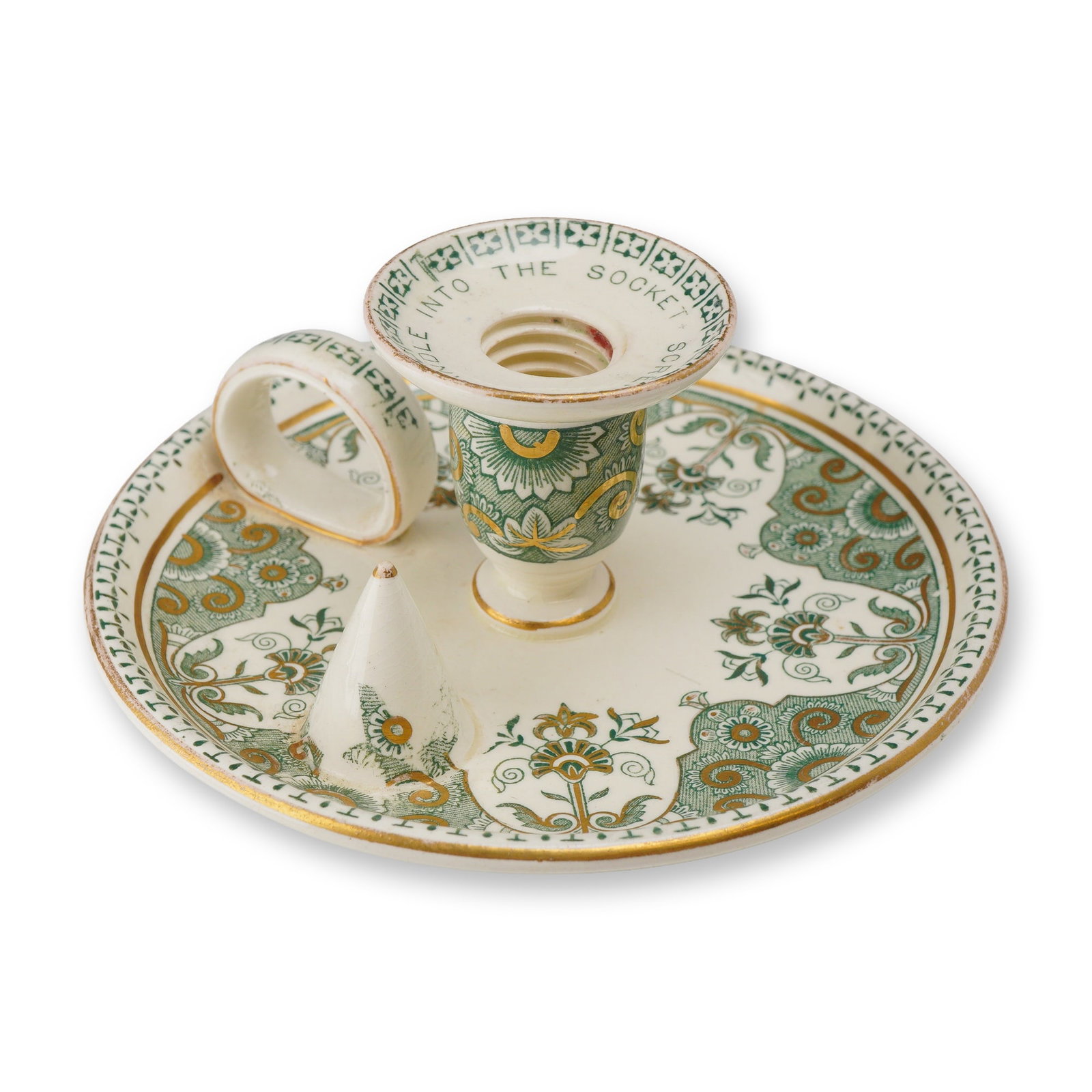 Wedgwood Victorian Earthenware Chamberstick with Screw Socket, c 1886: The circular dished base with an integrated ring handle and a matching conical snuffer that rests on a small ceramic peg. The piece is decorated in the Aesthetic Movement style with a green transfer p