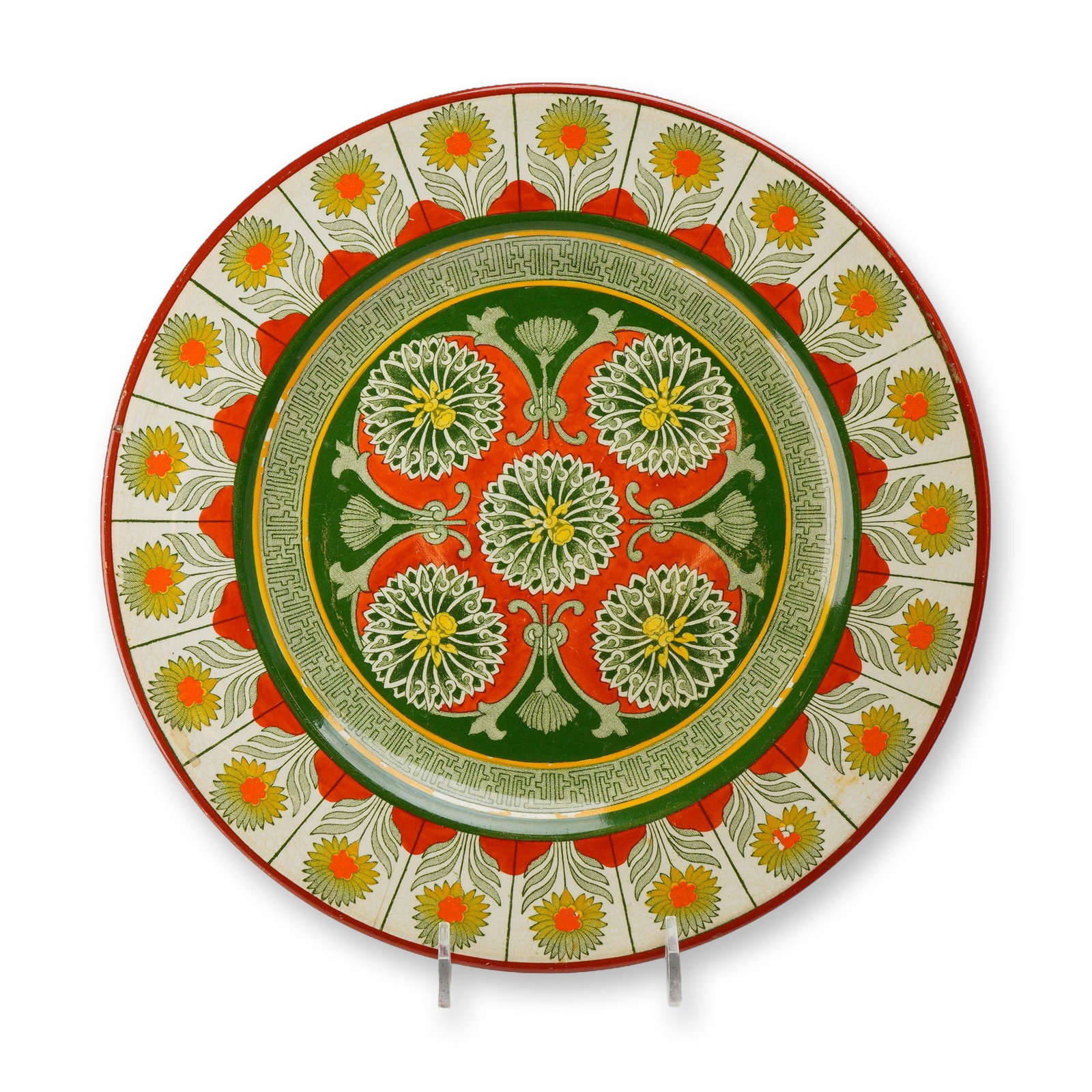 Wedgwood Etruria England Marigold Pattern Earthenware Plate: A Wedgwood earthenware plate decorated in the Aesthetic Movement Marigold pattern. The circular plate features a complex floral design with a central medallion containing five multi-petaled floral hea