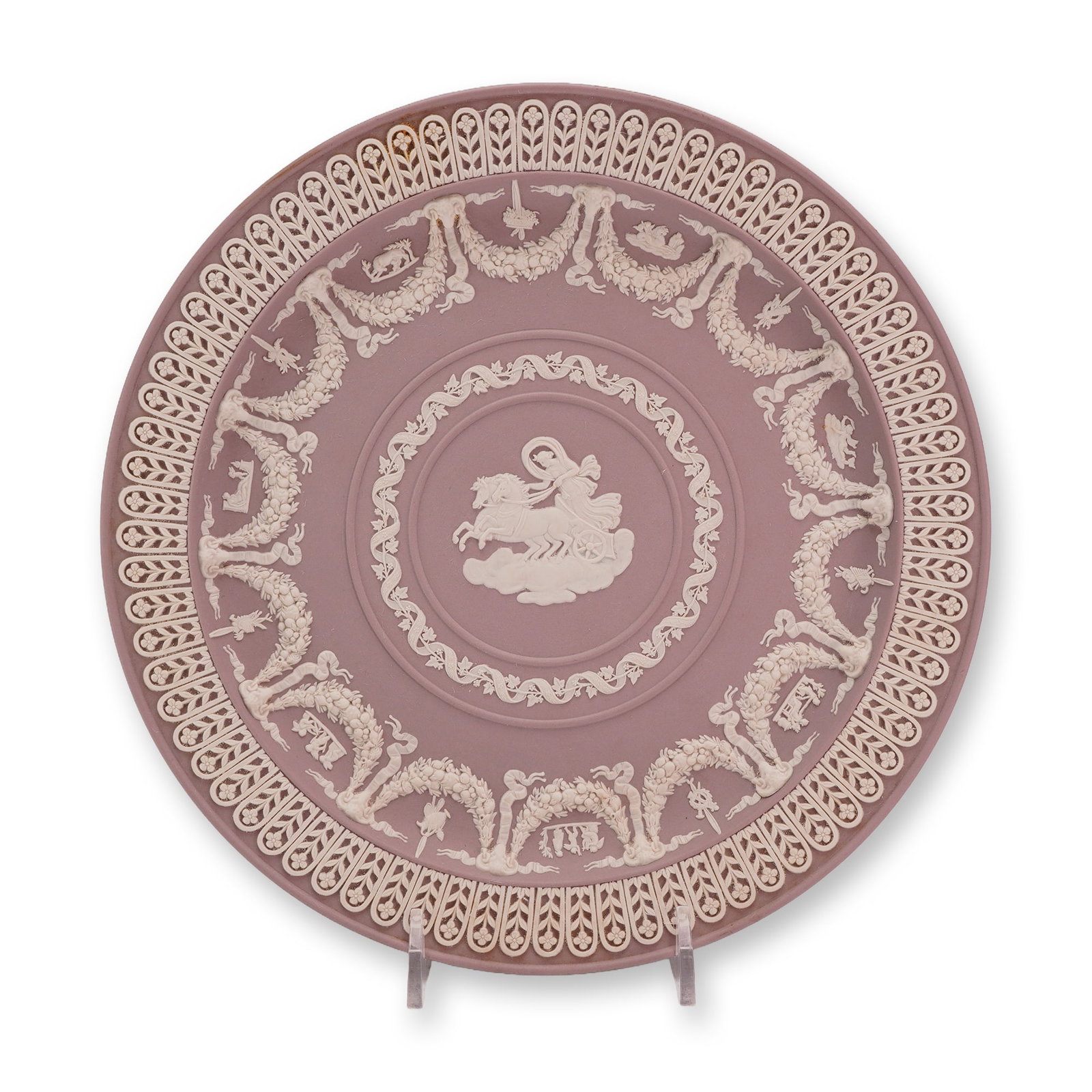 Wedgwood Lilac Jasperware Decorative Plate from the Rubin Collection: This Wedgwood lilac jasperware decorative plate features white sprigged relief decoration applied to a lavender-colored fine-grained stoneware body. The central medallion depicts the classical figure 