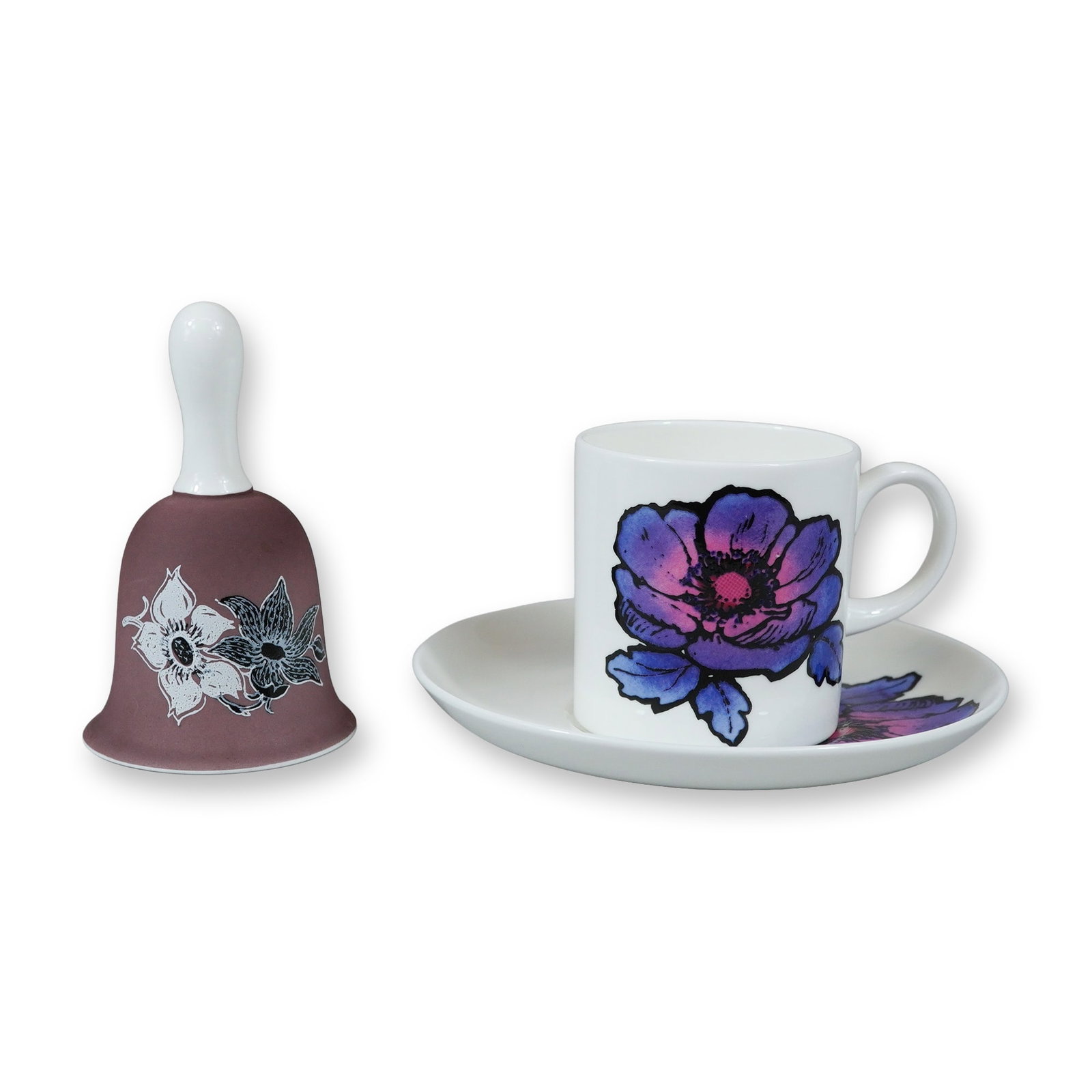 3pc Wedgwood Susie Cooper Design Fine Bone China Items: This trio of fine bone china consists of a cup, a saucer, and a hand bell, all produced by Wedgwood and featuring designs by Susie Cooper. The cup and saucer are decorated in the Blue Anemone pattern,