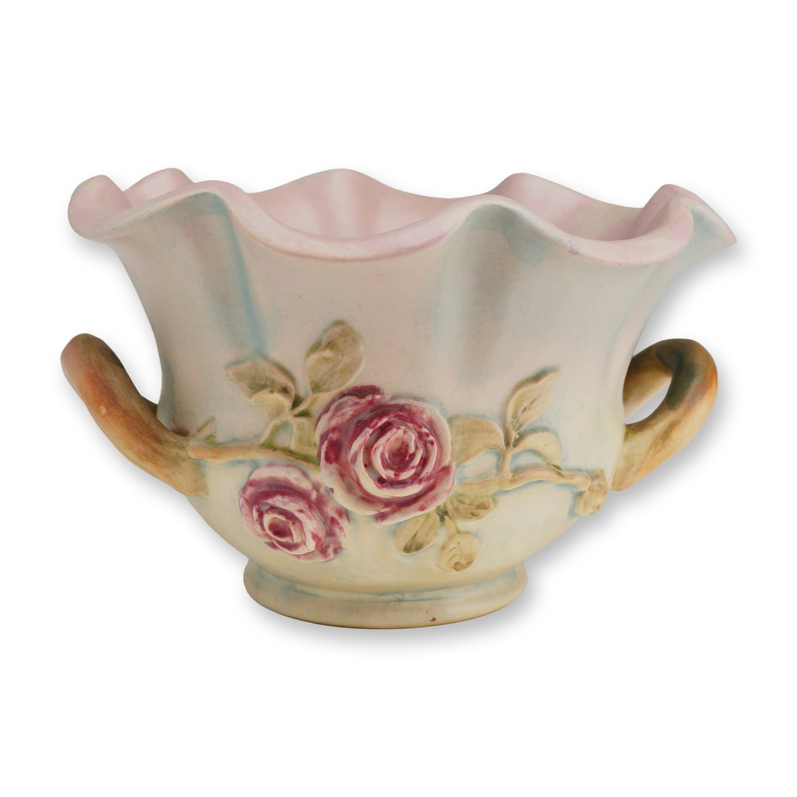 Weller Pottery Melrose Pattern Handled Footed Bowl: A vintage Weller Pottery footed vessel from the Melrose line, that features a wide, ruffled rim and two C-scroll loop handles, finished in a characteristic matte glaze with a pastel palette of cream a