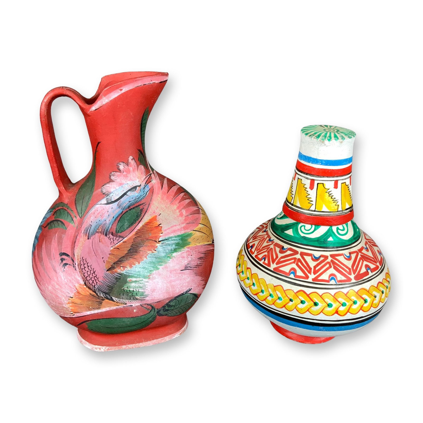 3pc Mexican Tonala Pottery, Pitcher and a Water Jug with Tumbler Lid: This Tonala pottery lot comprises two hand-painted Mexican earthenware vessels. The first item is a bulbous pitcher featuring a narrow neck, a flared spout, and a single loop handle. It is decorated w