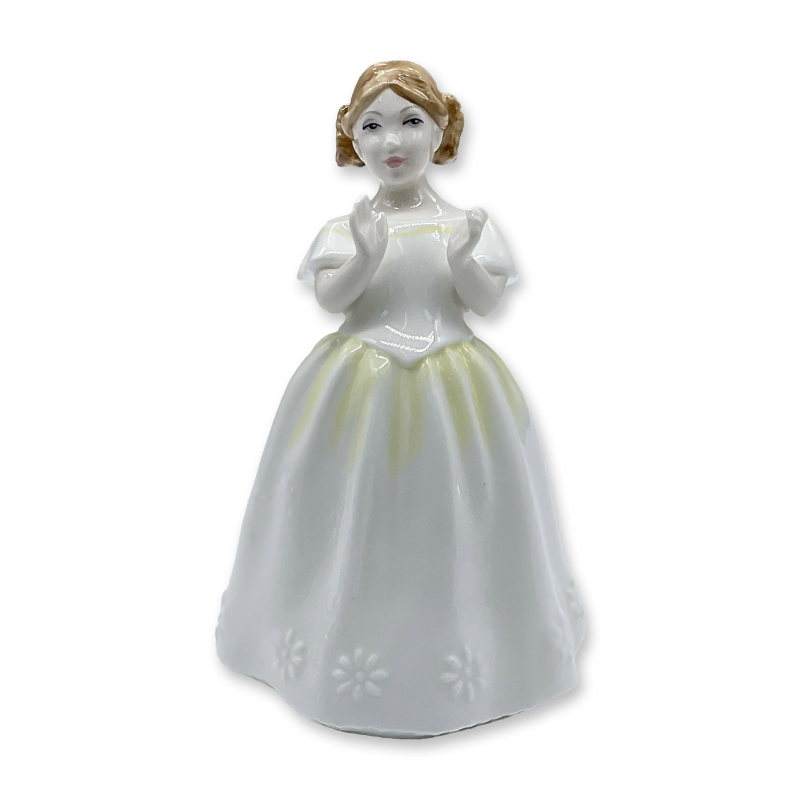 Royal Doulton Bone China Figurine, Catherine HN3451: A lovely figure of a small girl in a white dress clapping. Part of the Child Study series. Royal Doulton backstamp. Artist: Pauline Parsons Dimensions: 3"L x 3"W x 5"H Date or Era: 1993 - 1999 Manufac