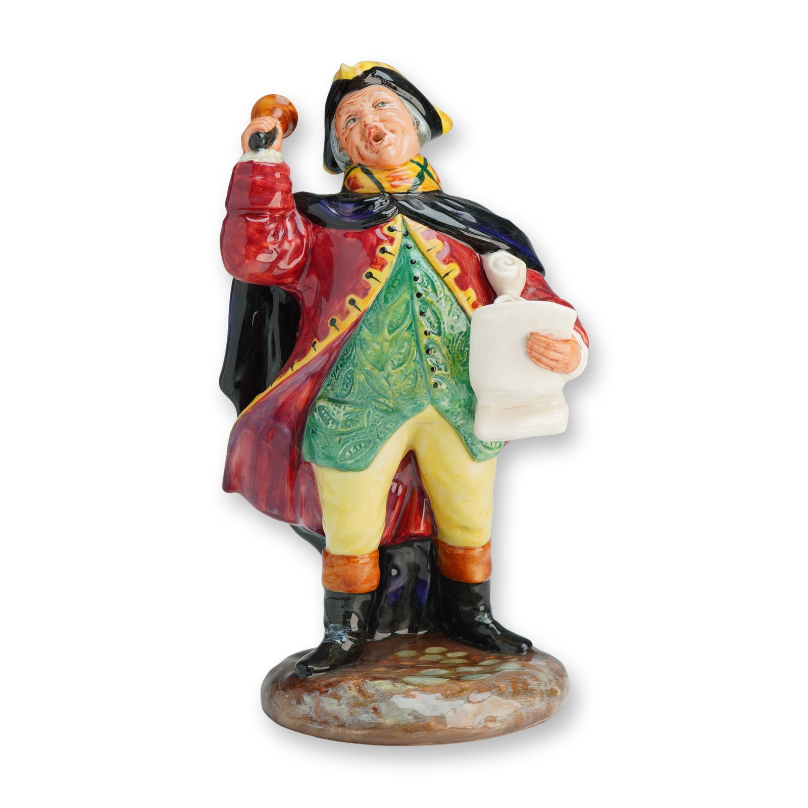 Royal Doulton Figurine Town Crier HN2119: A Royal Doulton designed by Peggy Davies depicts a male town crier in traditional mid-18th-century attire, modeled in a dynamic pose with his mouth open as if shouting. He holds a handbell in his rais