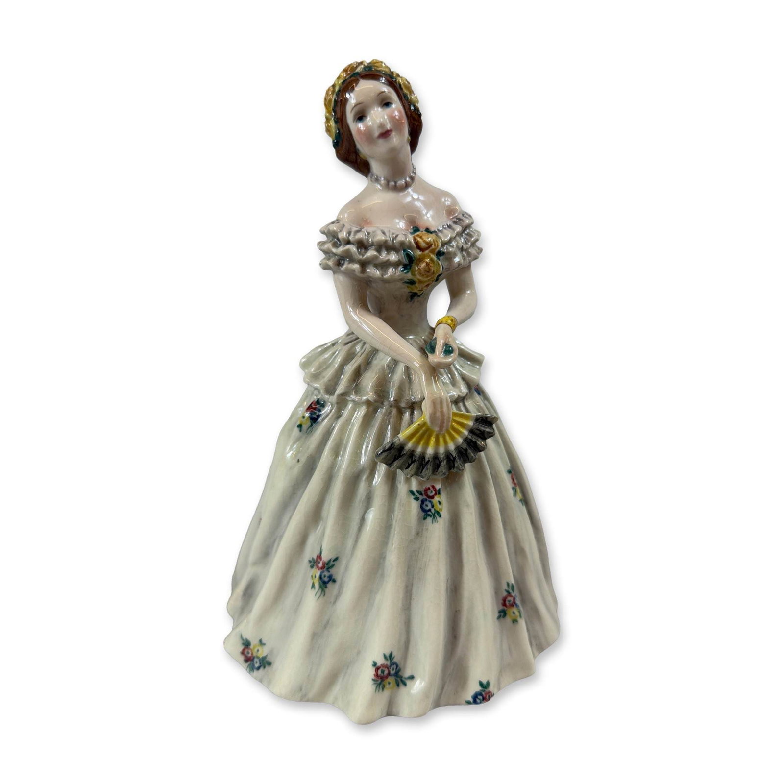Gort Bone China Mrs Lincoln Figurine: Gort Bone China glazed porcelain figurine titled Mrs. Lincoln, depicting Mary Todd Lincoln in a mid-19th-century crinoline gown decorated with small multicolored floral sprigs, a ruffled off-the-shoul