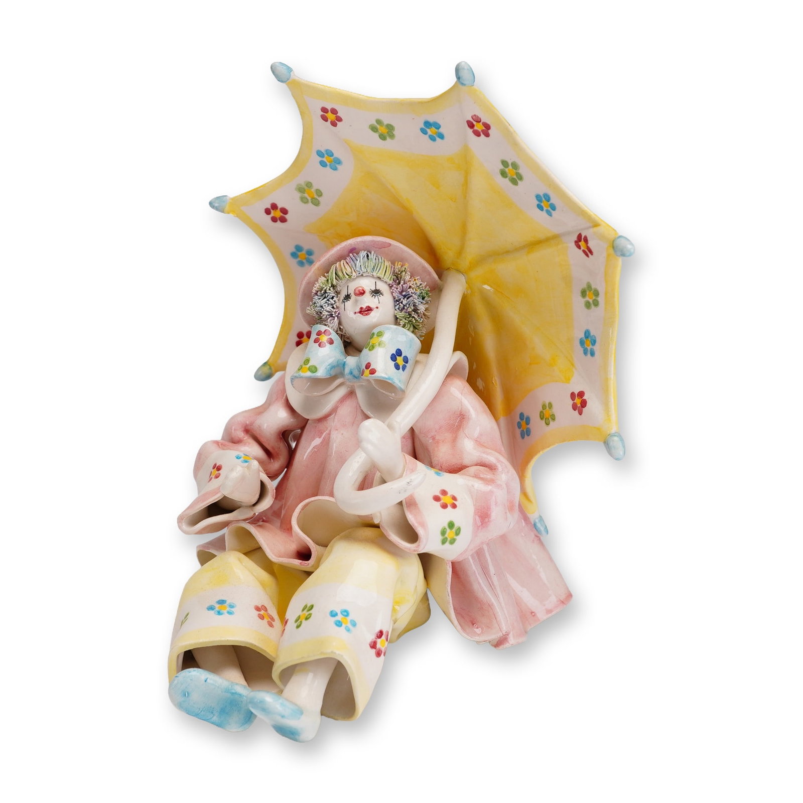 Gump's Italian Ceramic Seated Clown with Parasol: This is a whimsical, large-scale hand-painted glazed ceramic figurine of a seated clown, produced in Italy for Gump's San Francisco. The figure is elaborately dressed in a ruffled pink jacket over yel