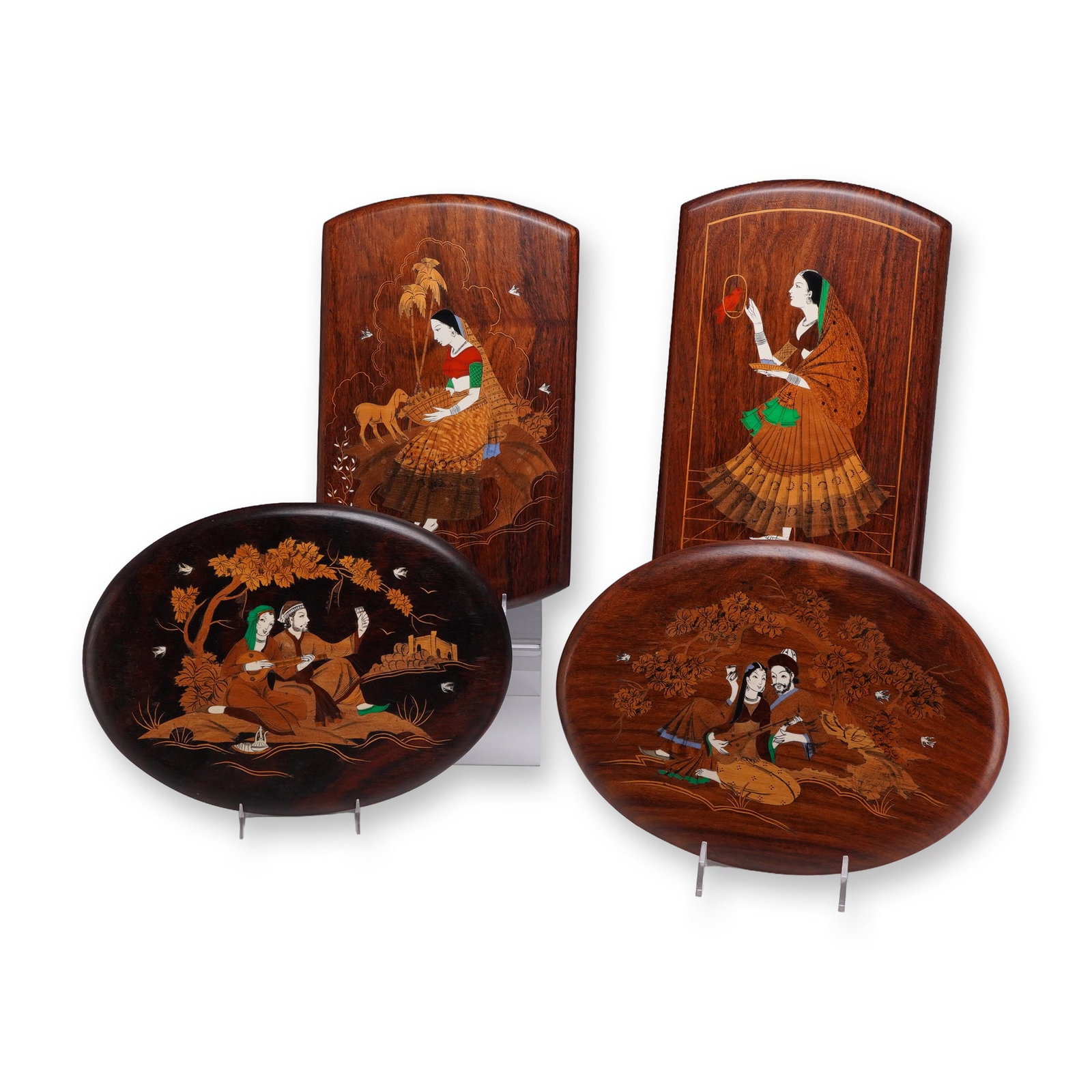 4pc Indian Wood and Bone Marquetry Inlay Wall Plaques: A set of four vintage Indian wood and bone marquetry inlay wall plaques, comprising two large oval shaped and two large rectangular panels. The items feature intricate wood and bone or synthetic inlay
