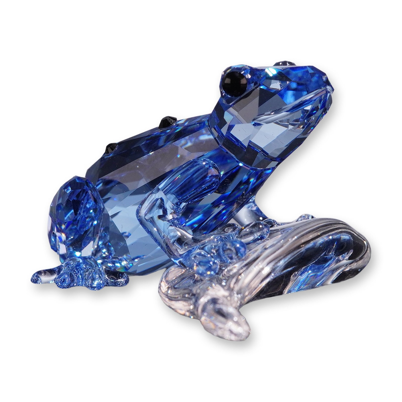 Swarovski SCS 2009 Event Piece Figurine, Blue Dart Frog: Swarovski SCS 2009 Event Piece crystal figurine depicting a blue poison dart frog. The frog is crafted from faceted cobalt blue crystal with black crystal spots on its back and black crystal eyes, res