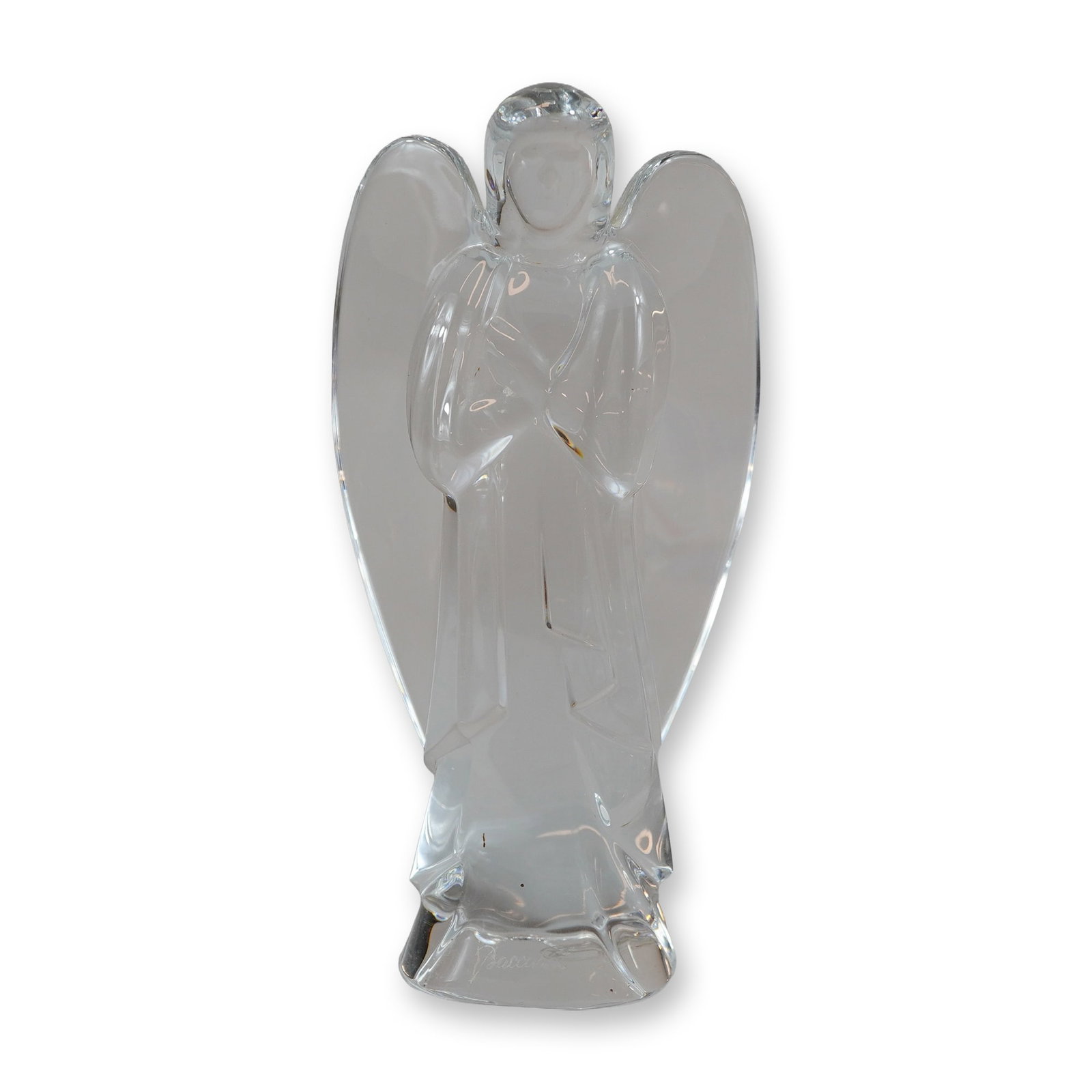 Baccarat French Clear Crystal Angel Figurine: Baccarat clear polished lead crystal angel figurine, made in France. The stylized standing figure is depicted with arms crossed over the chest and upward-sweeping wings. Near the front lower edge is a