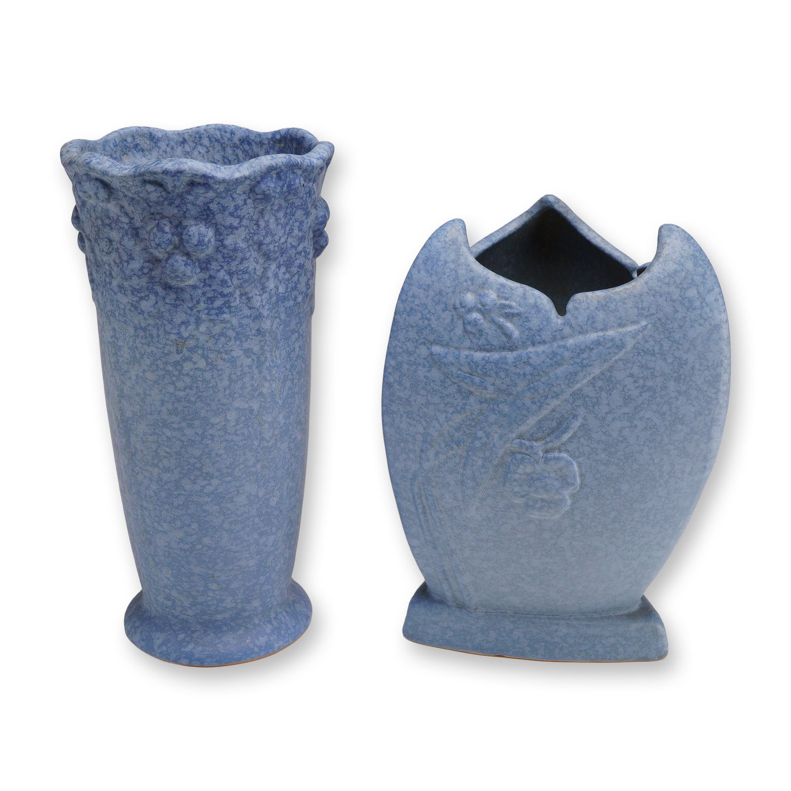 Two Weller Pottery Triangle and Trumpet Vases, Blue Sydonia: This lot consists of two American art pottery ceramic vases from the Art Deco period, circa 1930s, each featuring a mottled periwinkle blue matte glaze. The first piece is a tall, tapered cylindrical 