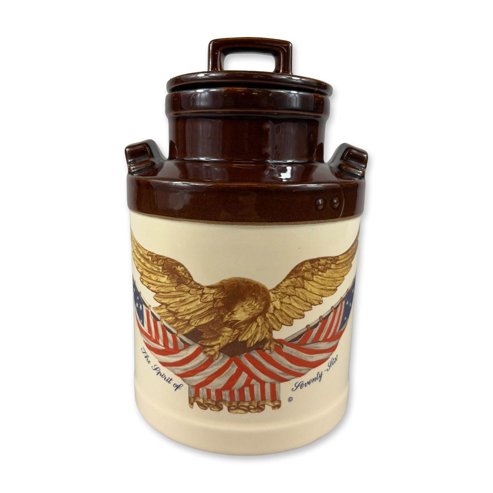 McCoy Spirit of Seventy-Six Ceramic Canister: McCoy Pottery. Commemorative ceramic canister designed in the form of a traditional milk can, produced to mark the American Bicentennial. The vessel features a two-tone chocolate brown and cream glaze