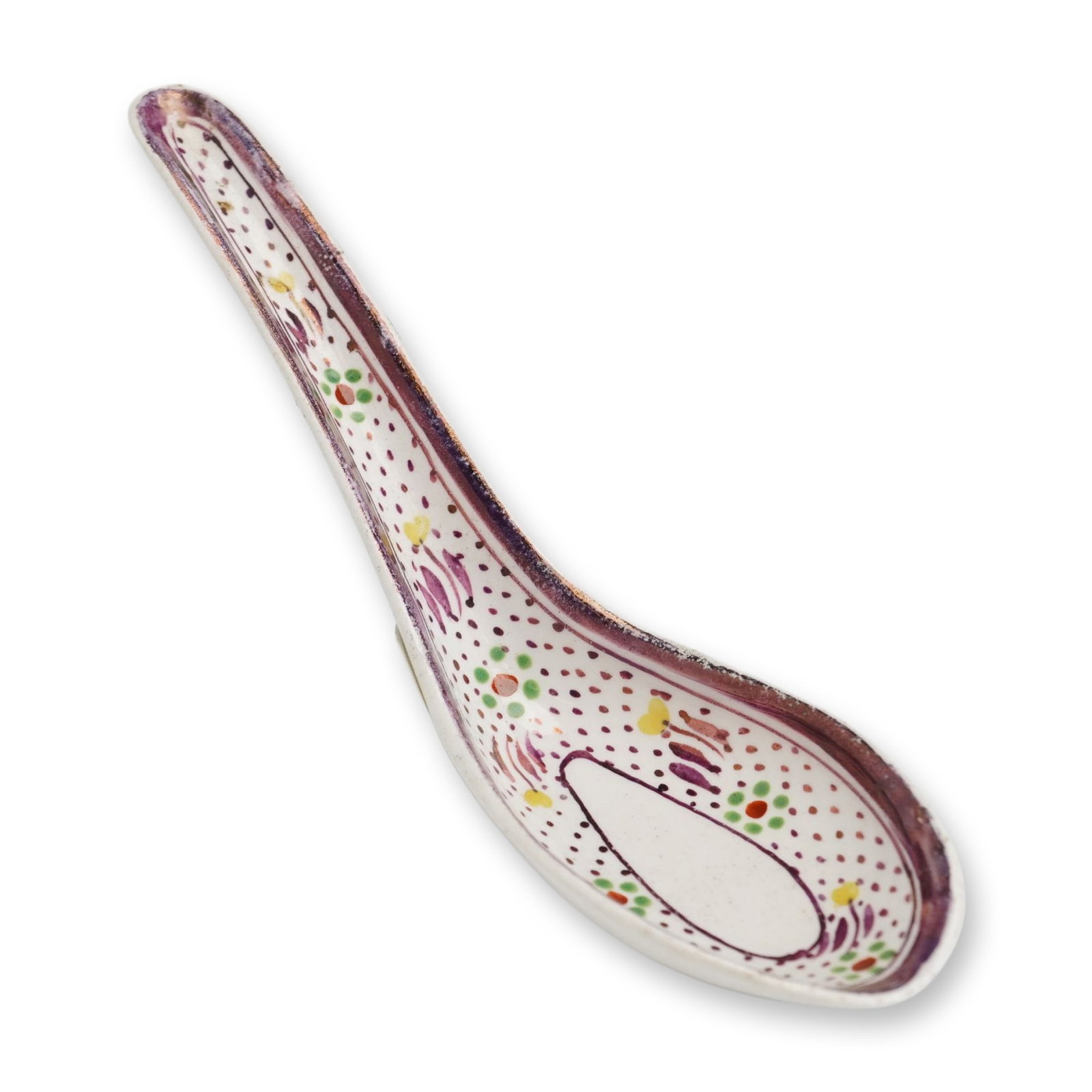 Wedgwood Pearlware Oriental Style Soup Spoon: A Wedgwood pearlware earthenware soup spoon in the Oriental style, featuring a deep bowl and curved handle. The interior is decorated with hand-painted overglaze stylized floral and foliate motifs in 