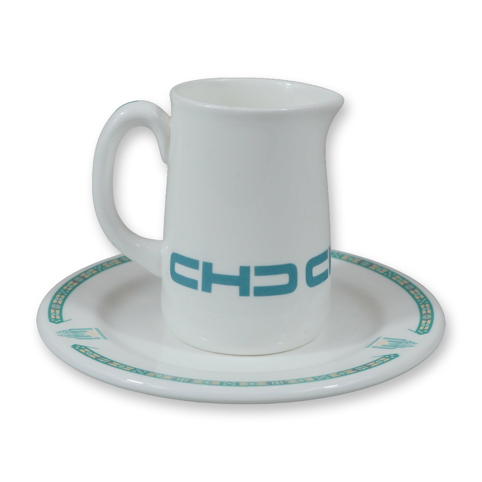 2pc Wedgwood Bone China Hotelware Saucer and Pitcher: A lot consisting of two pieces of English bone china hotelware manufactured by Wedgwood. The lot includes one small saucer and one small cream pitcher. The saucer is constructed from metallized bone c