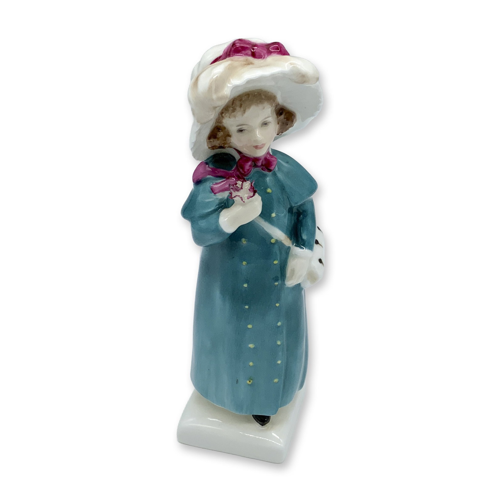 Carrie HN2800 - Royal Doulton Figurine: This girl in a turquoise dress figure from the Kate Greenaway Collection is based of one of Kate's books named Under The Window which contains idyllic verses concerning children who endlessly gathered