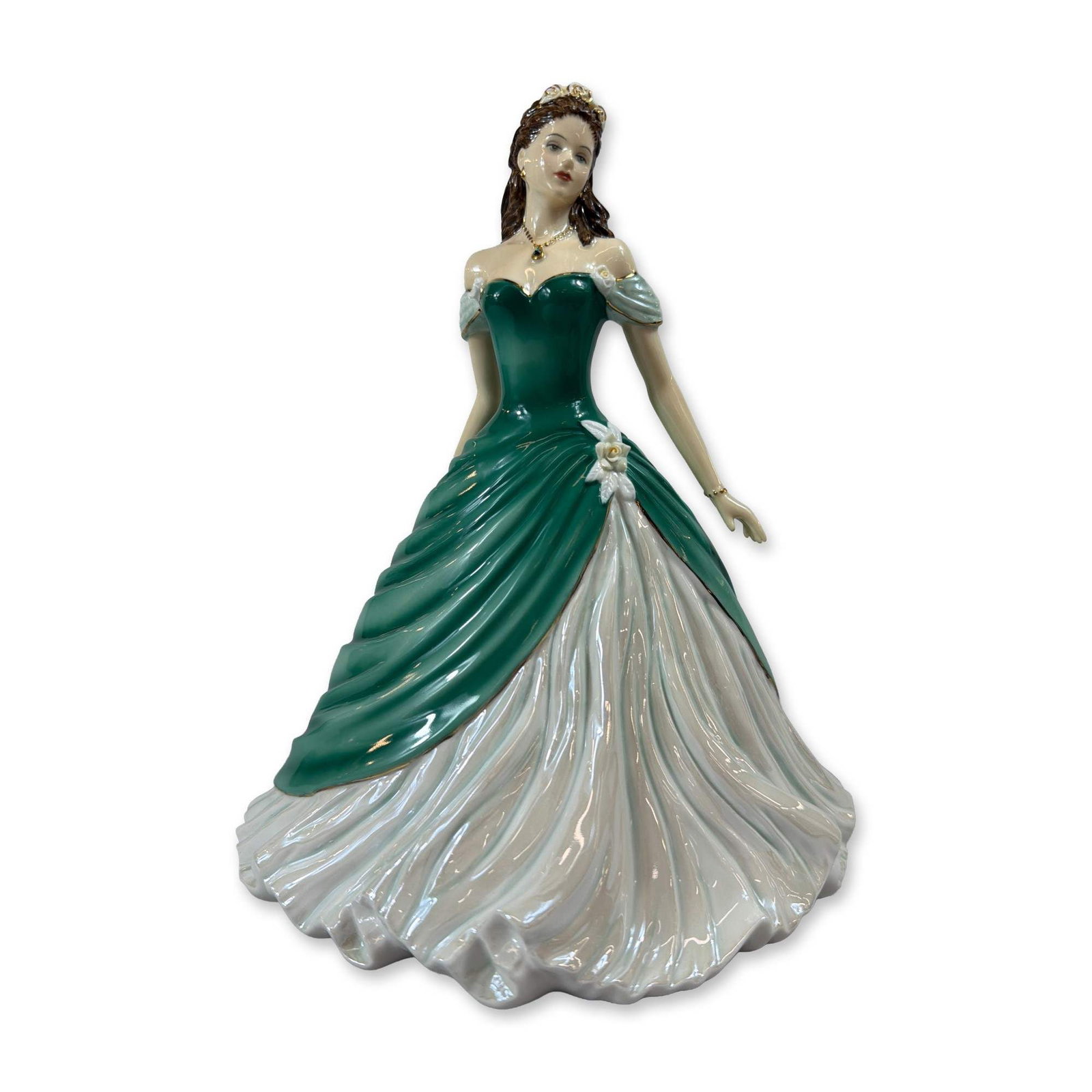 Royal Doulton Jade HN 5794 Porcelain Figurine: Royal Doulton hand-decorated bone china figurine titled Jade, model HN 5794. Designed as a Canadian Exclusive for Caesars Windsor, the figure depicts a woman in a draped emerald green bodice and overs
