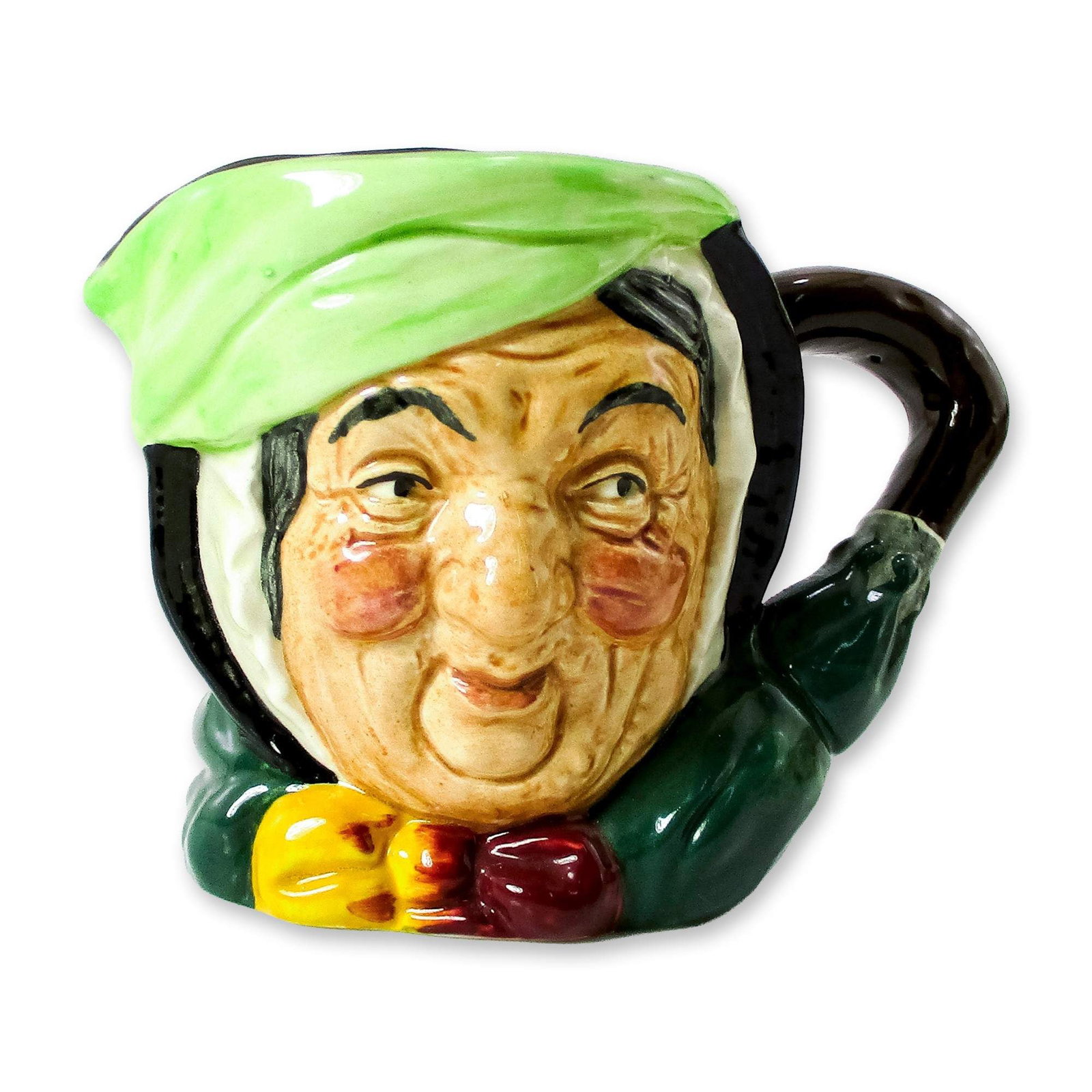 Sairey Gamp D5528 - Small - Royal Doulton Character Jug: Black hair; light green band; dark green coat; yellow and burgundy bow; green umbrella with brown handle. In Charles Dickens' 1843 novel, "Martin Chuzzlewit" Sairey Gamp is a gossiping, gin-drinking m