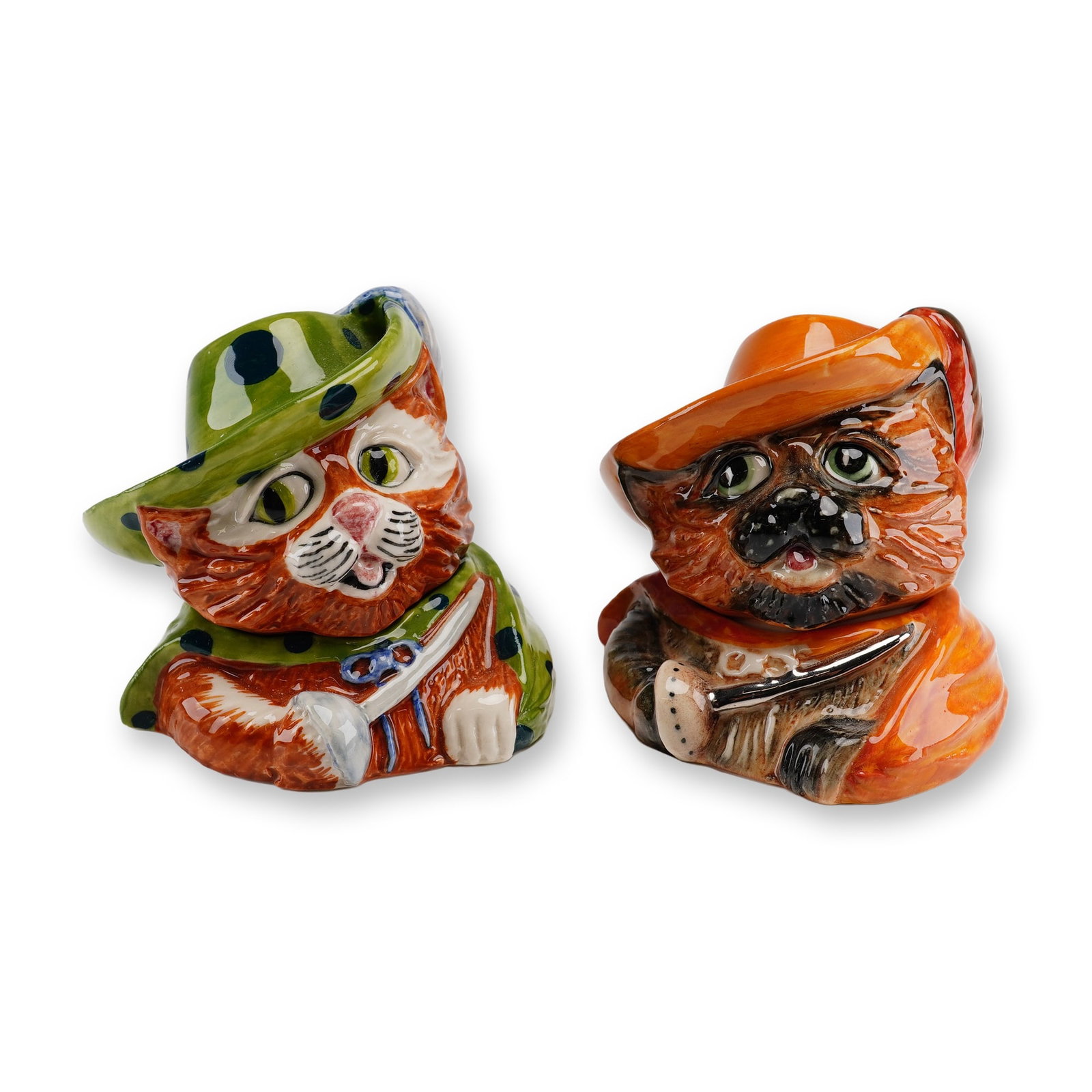Pair of Kevin Francis Face Pots Lidded Pots Puss in Boots: This lot consists of two hand-painted and glazed ceramic miniature lidded pots from the Kevin Francis Face Pots collection, both depicting the character Puss in Boots. Each piece is designed as an ant
