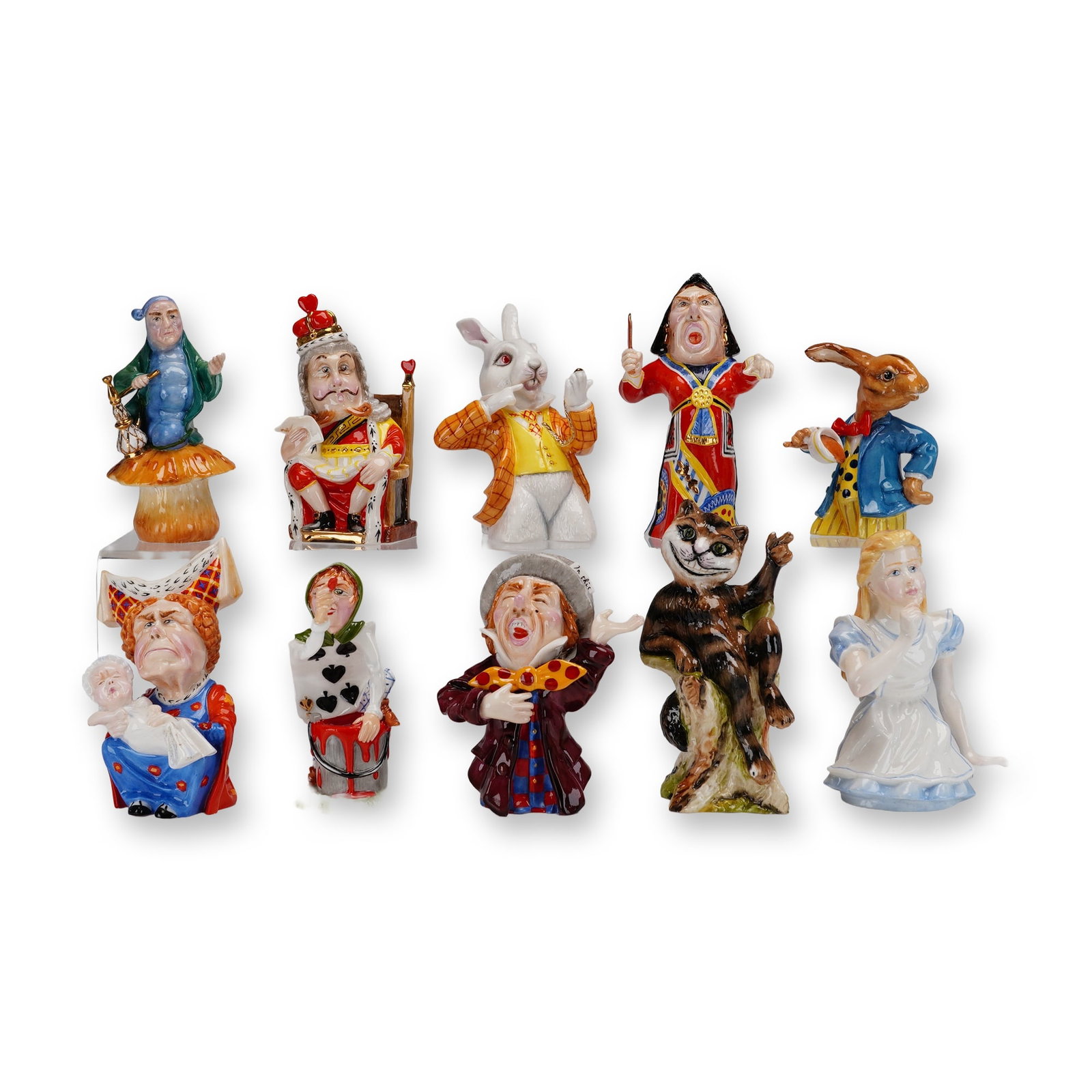 10pc Bronte Porcelain Alice in Wonderland Candle Snuffers: Presented are ten glazed hand painted bone china candle snuffers modeled as characters from the classic Alice in Wonderland story. The figures include Alice, Cheshire Cat, Mad Hatter, White Rabbit, Ma
