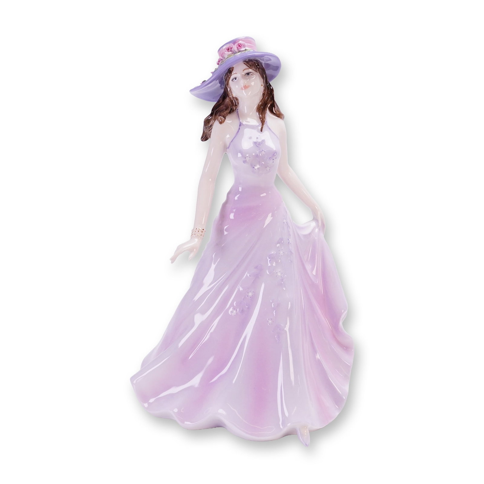 Coalport Ladies of Fashion Figurine, Emma: A Coalport figurine from the Ladies of Fashion series, modeled by Jack Glynn. The figure is depicted in a walking pose wearing a lavender and lilac halter-style gown with floral accents and a wide-bri